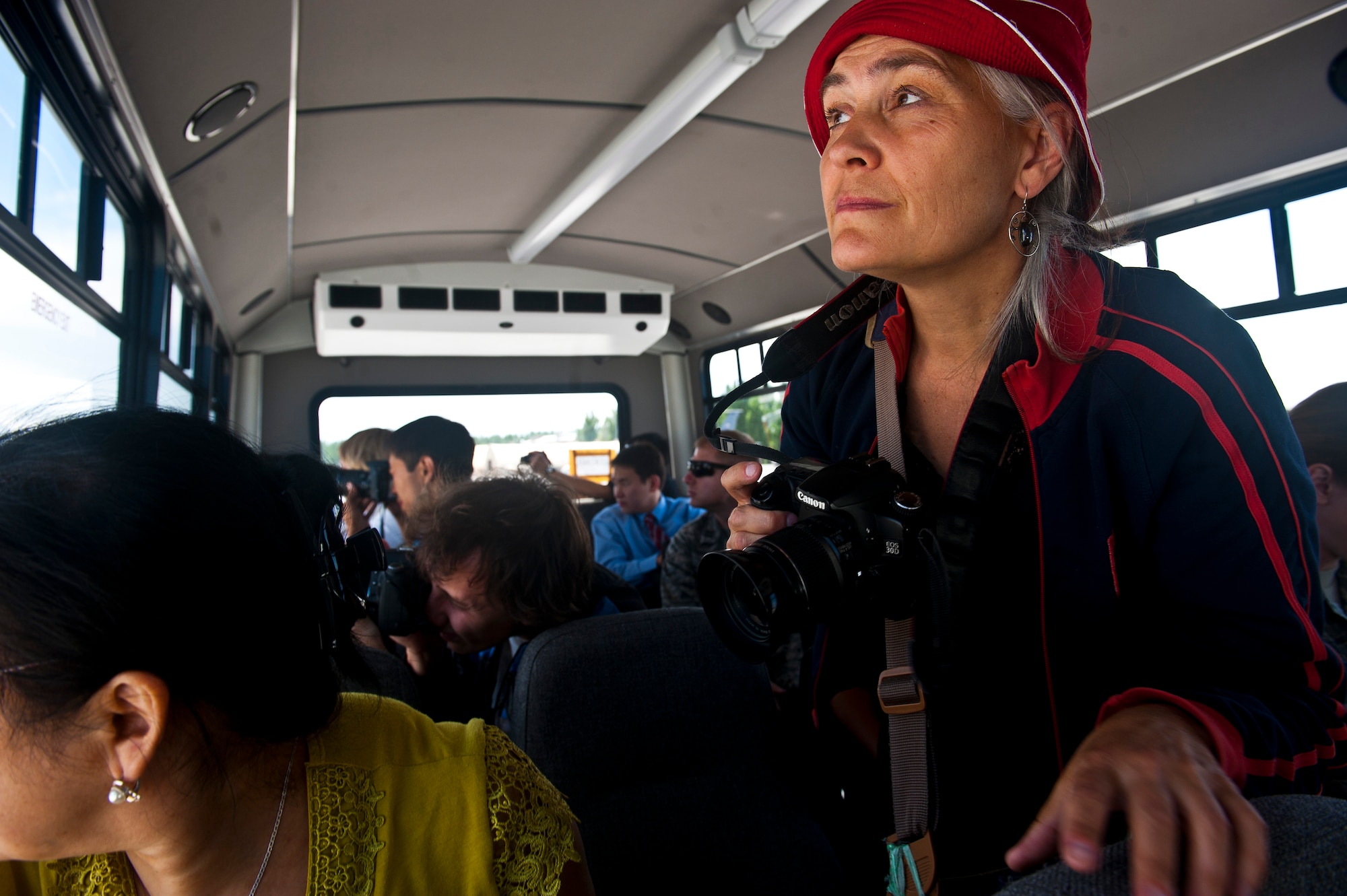 Irina Bairamukova looks out at a C-17 Globemaster III at the Transit Center at Manas, Kyrgyzstan, June 8, 2012. It was the same aircraft that the media witnessed during an aerial refueling capability demonstration over Kyrgzystan. Bairamukova is a reporter with the Times of Central Asia. (U.S. Air Force photo/Senior Airman Brett Clashman))