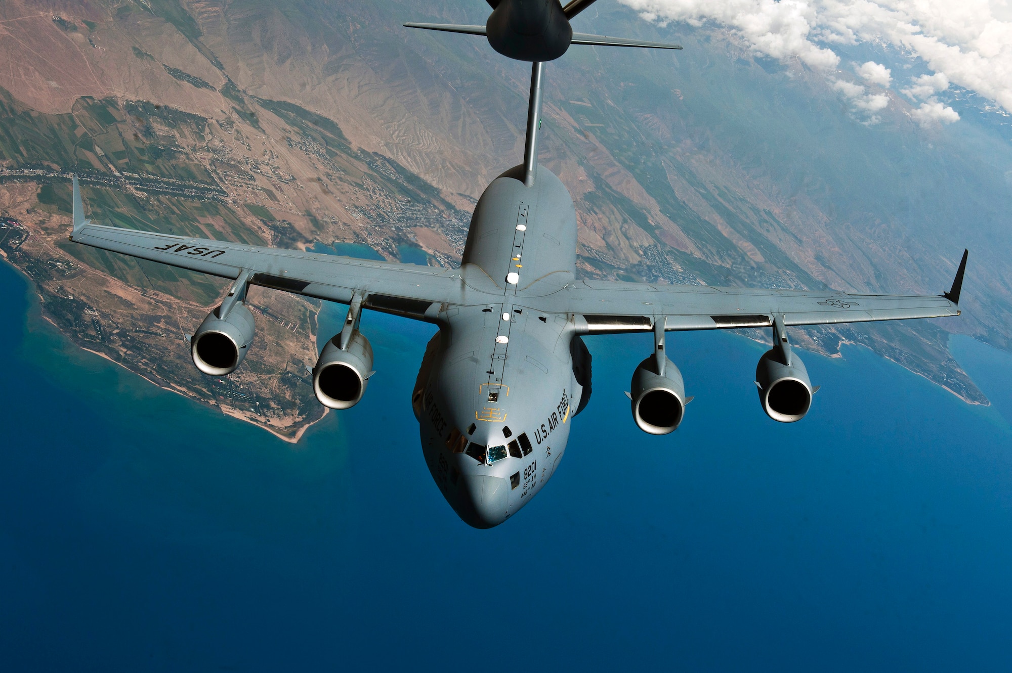 A C-17 Globemaster III prepares to demonstrate aerial refueling capabilities during an aeriel refueling demonstration over Kyrgzystan, June 8, 2012. The C-17's primary mission is to transport personnel and cargo into and out of the AOR. (U.S. Air Force photo/Senior Airman Brett Clashman)