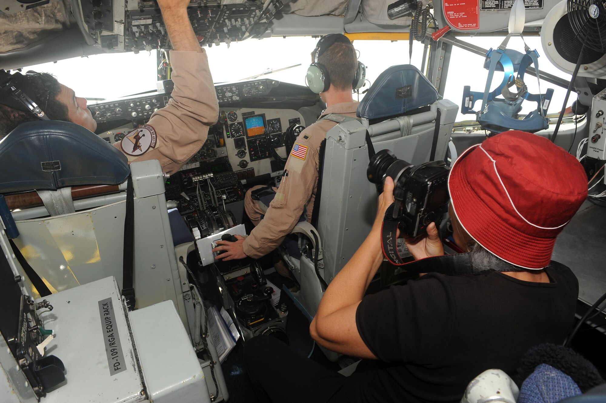 Irina Bairamukova documents 22nd Expeditionary Air Refueling Squadron pilots flying a KC-135 Stratotanker over Kyrgyzstan, June 8, 2012. The 22 EARS conduct daily aerial refueling missions with aircraft engaged in operations in Afghanistan. Bairamukova is a reporter with the Times of Central Asia. (U.S. Air Force photo/Senior Airman Brett Clashman)