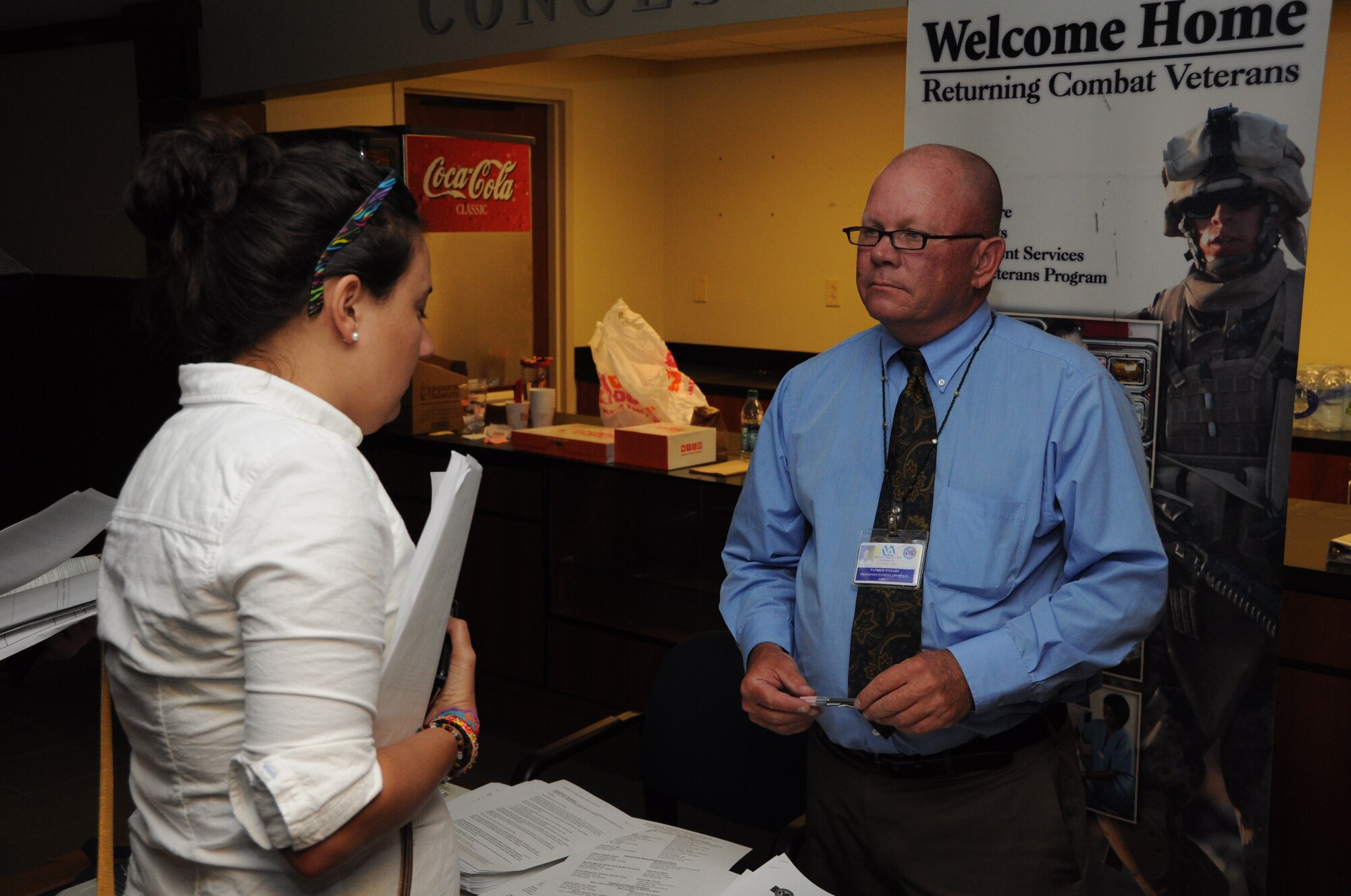 Pat O’Leary assist an Air Force Individual Ready Reserve member at the Joint Base Charleston, S.C. IRR muster June 08, 2012. The muster gave IRR members the opportunity to update their contact information and medical records as well as receive information about current veteran’s benefits and U.S. Air Force Reserve opportunities. O’Leary is the transitional patient advocate at the Ralph H. Johnson VAMC in Charleston, S.C. (U.S. Air Force Photo/Staff Sgt. Shane Ellis)