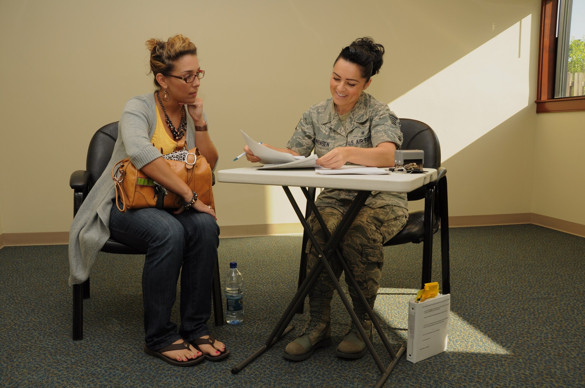 Staff Sgt. Sheryl Sorensen reviews Sarah Burdon’s medical record during the Joint Base Charleston, S.C. IRR muster June 08, 2012. More than 200 IRR members received orders to attend the JBC IRR muster where members had the opportunity to update their contact information and medical records as well as receive information about current veteran’s benefits and U.S. Air Force Reserve opportunities. Sergeant Sorensen is a 315th Aerospace Medicine Squadron medical technician and Burden is a former 315 AW intelligence officer. (U.S. Air Force Photo/Staff Sgt. Shane Ellis)