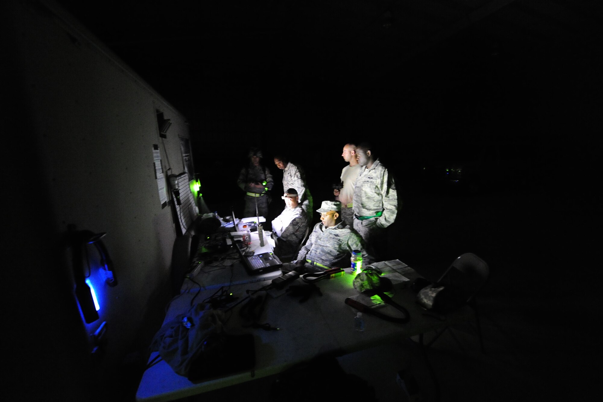 Airmen from the 621st Contingency Response Wing, stationed at Joint Base McGuire-Dix-Lakehurst, N.J., conduct airfield command and control operations for Holland Landing Zone, Fort Bragg, N.C., during Joint Operations Access Exercise 12-02, June 6. JOAX is a two-week forcible entry and ground combat exercise to prepare Air Force and Army service members to respond to worldwide crises and contingencies.(U.S. Air Force photo by Tech. Sgt. Parker Gyokeres)