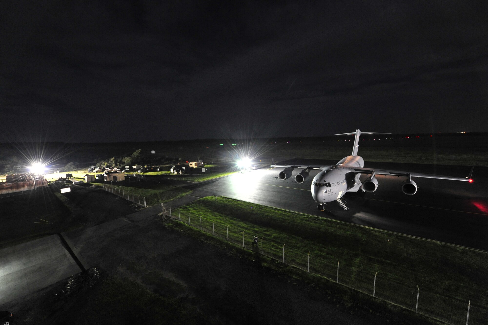 A C-17 Globemaster III sits at an intermediate staging base established at Mackall Army Airfield, N.C. by the 621st Contingency Response Wing, stationed at Joint Base McGuire-Dix-Lakehurst, N.J. and U.S. Army Soldiers of the 688th Rapid Port Opening Element from Joint Base Langley-Eustis, Va., during Joint Operational Access Exercise 12-02, June 4.  JOAX is a two-week exercise to prepare Air Force and Army service members to respond to worldwide crises and contingencies.  (U.S. Air Force photo by Tech. Sgt. Parker Gyokeres)