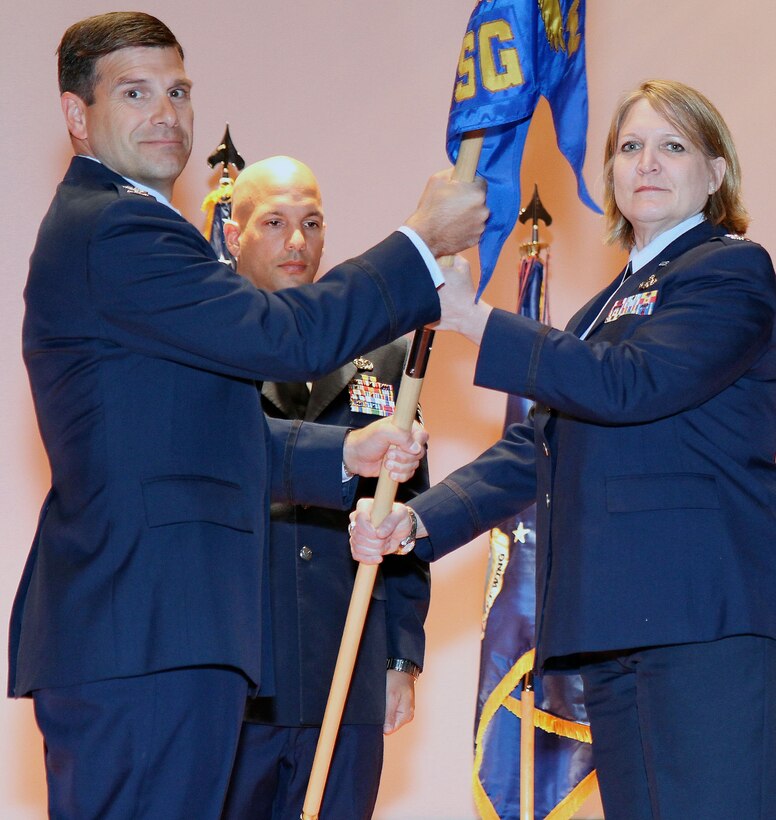 Col. Albert Lupenski, commander of the 932nd Airlift Wing, gives command of the 932nd Mission Support Group to Lt. Col Constance Jenkins.  Jenkins' previous assignment was deputy commander for Air Transportation, 349th Mission Support Group at Travis Air Force Base.  The assumption of command ceremony was held June 9 at Scott Air Force Base.  The 932nd MSG mission provides civil engineer and mission support, including base services, security force,s logistics and personnel support.  The 932nd AW is an Air Force Reserve Command wing that flies the C-40C aircraft.  (U.S. Air Force photo/Tech. Sgt. Christopher Parr) 