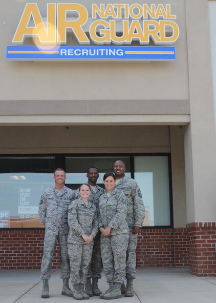 (L-R) U.S. Air Force recruiters Master Sgt. Robert Sweeny, Staff Sgt. Alexanderia Woodring, Tech Sgt. Robert Carr, Tech Sgt. Megan Chalk, and Senior Master Sgt. Raymond Butler introduce the new Air National Guard recruiting storefront in Baltimore, Md., to the community on June 9, 2012. (National Guard photo by Staff Sgt. Benjamin Hughes)