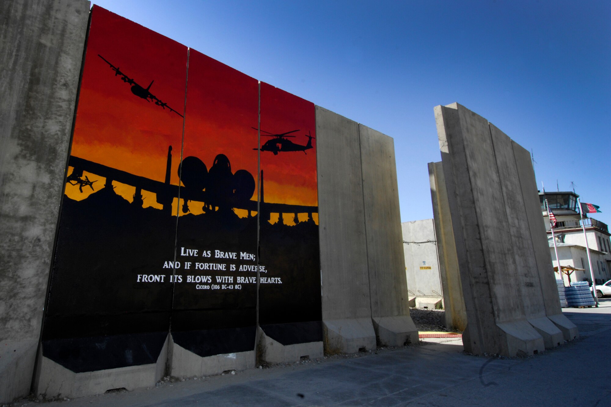 A completed mural stands in Camp Cunningham at Bagram Airfield, Afghanistan, June 10, 2012. The mural was painted by Route 5/6 Noncommissioned Officer Council volunteers to highlight airpower in Afghanistan. All three tiers of the U.S. Air Force Enlisted Corps will paint wall murals, each with a separate Air Force mission theme. (U.S. Air Force photo/Staff Sgt. Jeff Nevison)