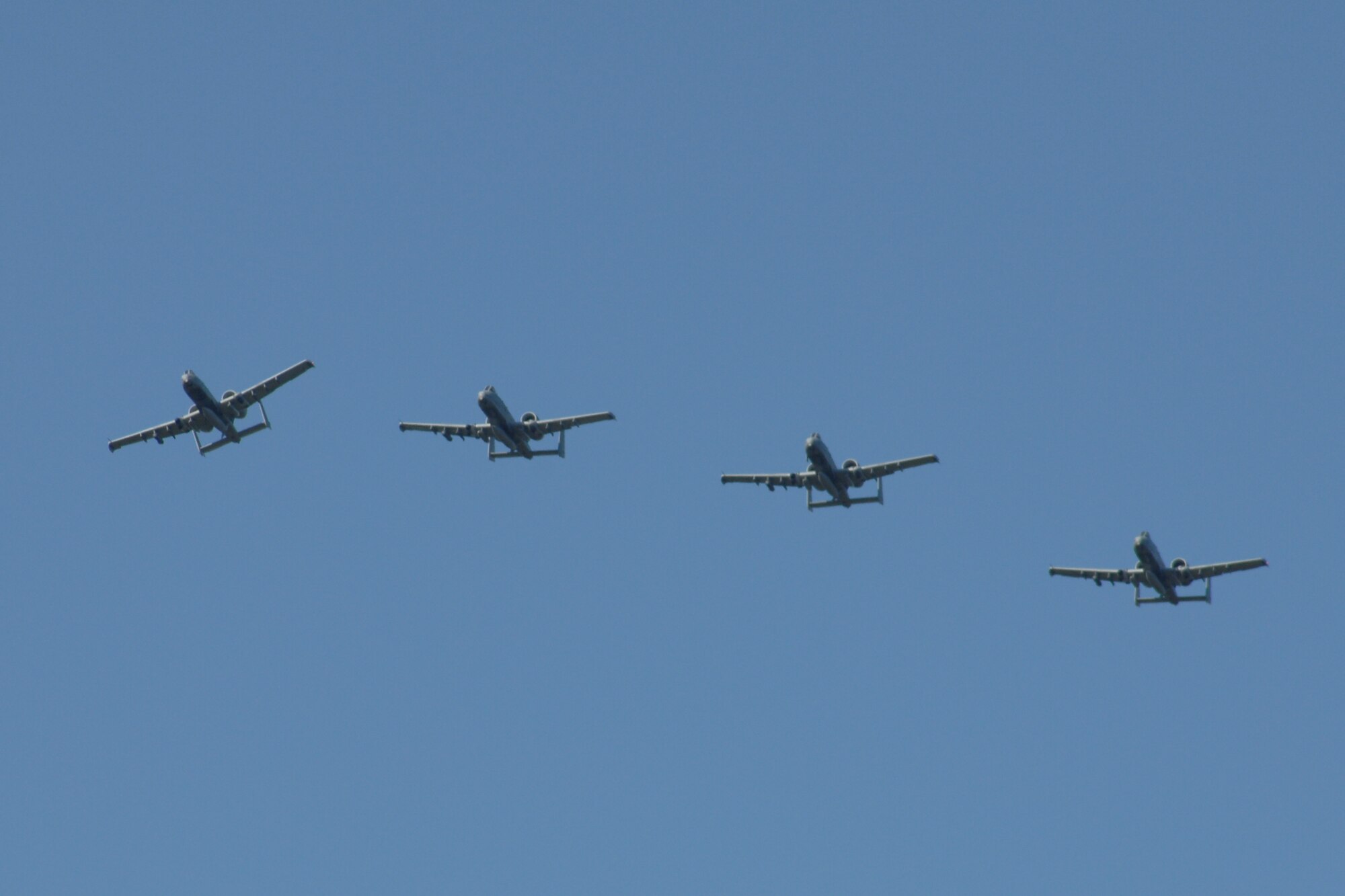 A formation of U.S. Air Force A-10 Thunderbolt II aircraft fly over Amari Air Base, Estonia, prior to landing, June 8, 2012. The aircraft, flown by the 107th Fighter Squadron, Michigan Air National Guard, are believed to be the first A-10s to ever land in Estonia. The aircraft and their Airmen were in Estonia to participate in Saber Strike 2012, a multi-national exercise based in Estonia and Latvia. (National Guard photo by SSgt. Rachel Barton)