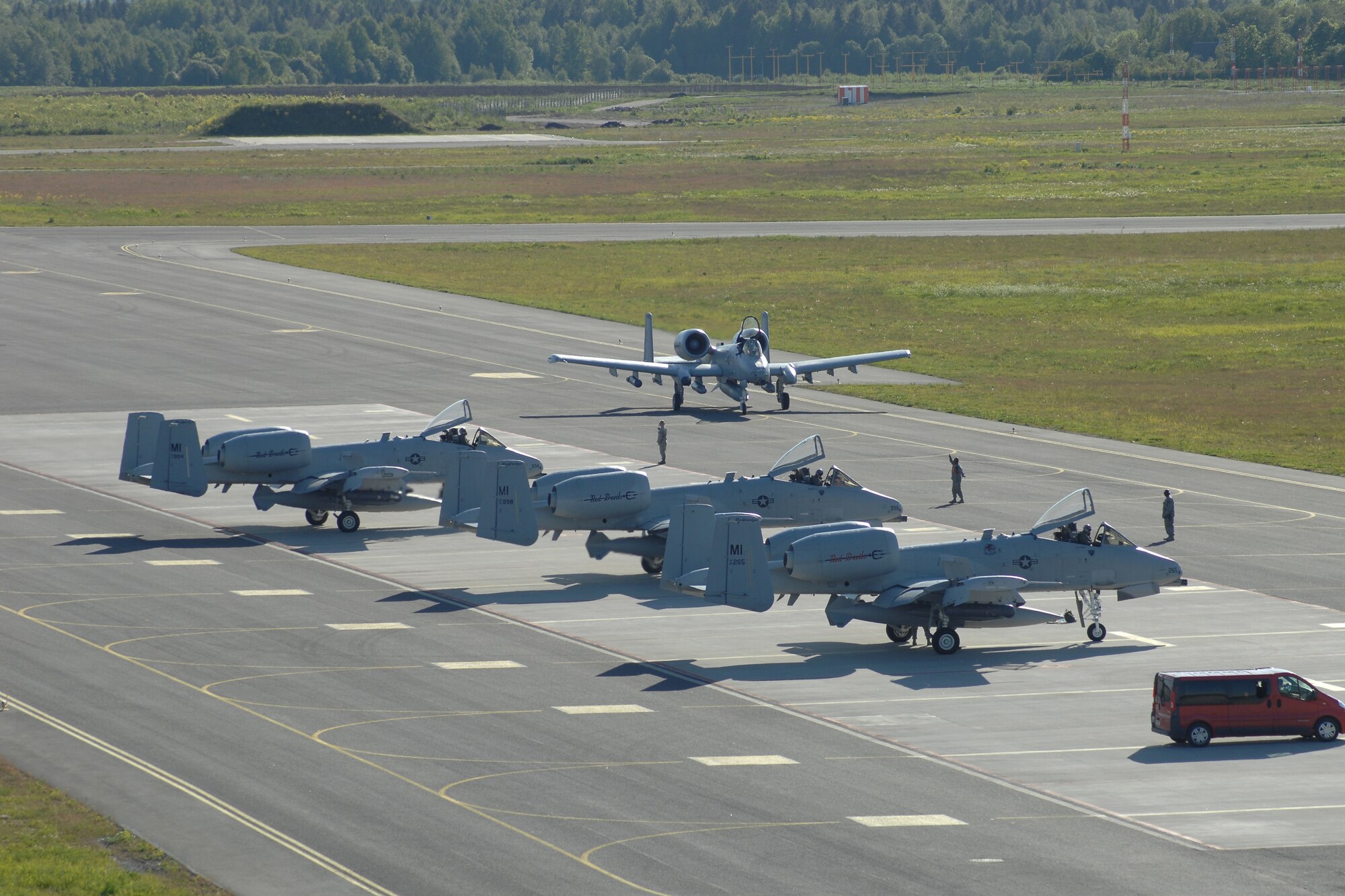 The final U.S. Air Force A-10 Thunderbolt II aircraft of a four-ship formation taxies in at Amari Air Base, Estonia, June 8, 2012. The aircraft, flown by the 107th Fighter Squadron, Michigan Air National Guard, are believed to be the first A-10s to ever land in Estonia. The aircraft and their Airmen were in Estonia to participate in Saber Strike 2012, a multi-national exercise based in Estonia and Latvia. (National Guard photo by SSgt. Rachel Barton)