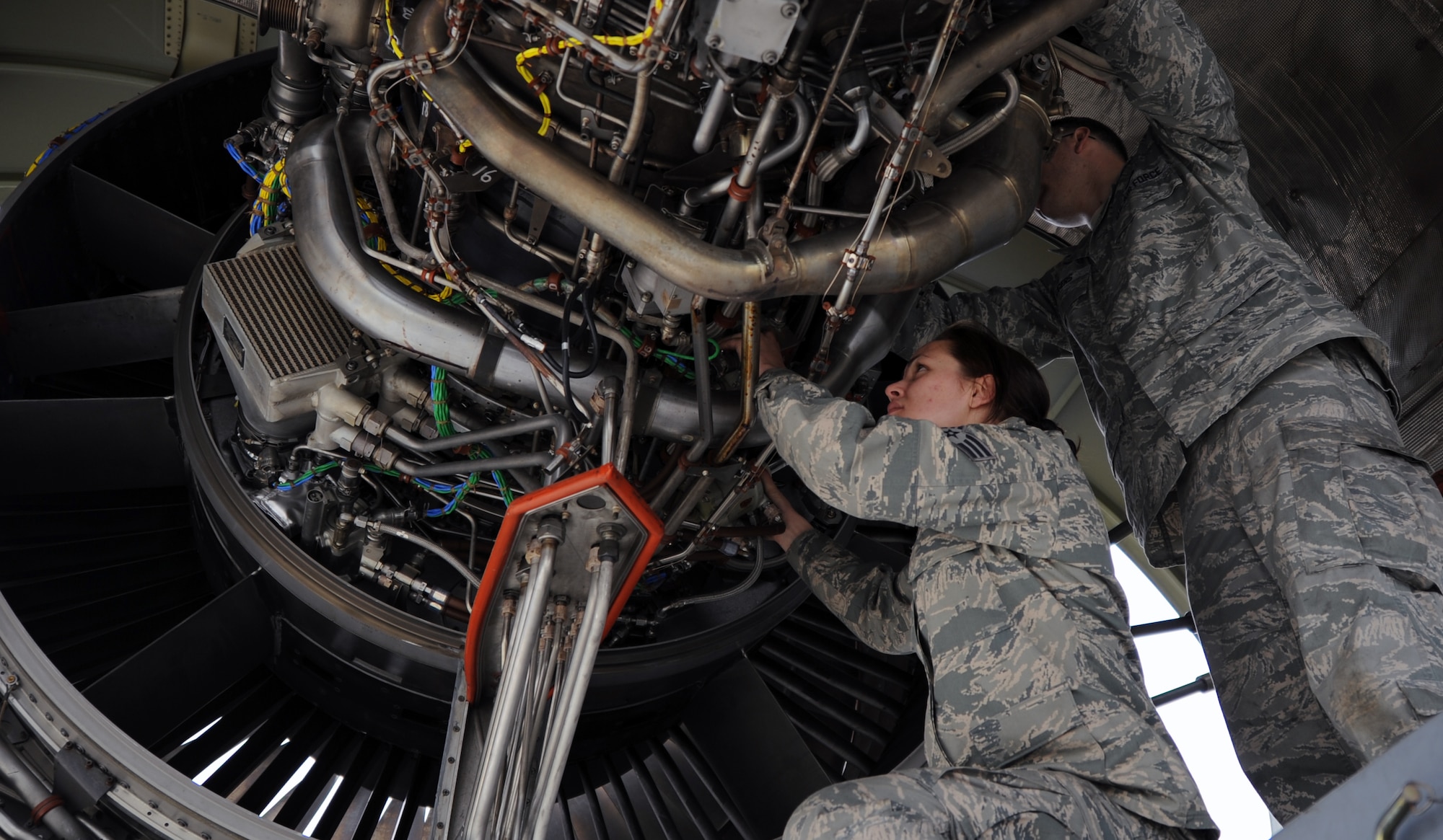 120606-F-MC921-002:  Senior Airman Genevieve Ramsey, an aerospace propulsion journeyman, and Staff Sgt. Joseph Leugers, a hydraulic systems craftsman, both from the 15th Aircraft Maintenance Squadron at Joint Base Pearl Harbor-Hickam, Hawaii, perform maintenance on an engine of a C-17 Globemaster III aircraft from the 535th Airlift Squadron deployed to Joint Base Elmendorf-Richardson, Alaska, as part of RED FLAG-Alaska June 8. RED FLAG-Alaska is one of the largest international air-combat employment exercises in the world and is designed to test the specific capabilities of the military units that take part in the exercise and increase their chance of survival during actual combat. (U.S. Air Force photo by Capt. Ben Sakrisson)