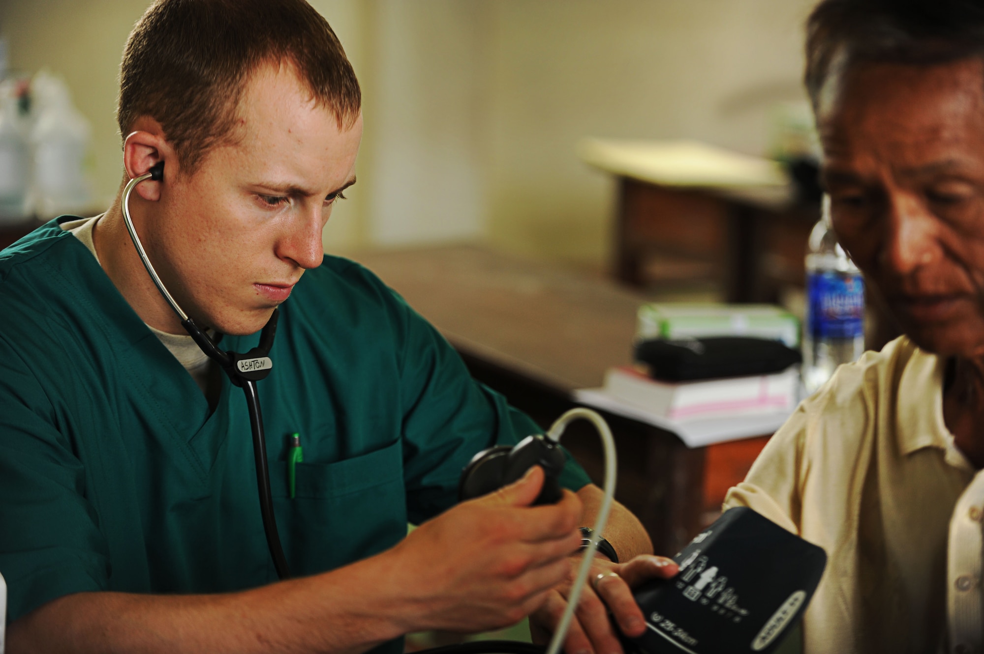 Staff Sgt. Ashton Alan, medical technician, takes the blood pressure of a local Vietnamese man at the Xuan Lam Primary School in Nghe An Province, Vietnam June 11 during Pacific Angel 2012.  Operation Pacific Angel gives the U.S. an opportunity to support the efforts of other governments in the Pacific  region by providing medical, dental, optometry and engineering assistance to the host nation citizens. Since 2007, U.S. military members have partnered together with host nation military personnel throughout the region to help improve the lives of tens of thousands of people through PACANGEL missions. (U.S. Air Force photo/Senior Airman Lauren Main)