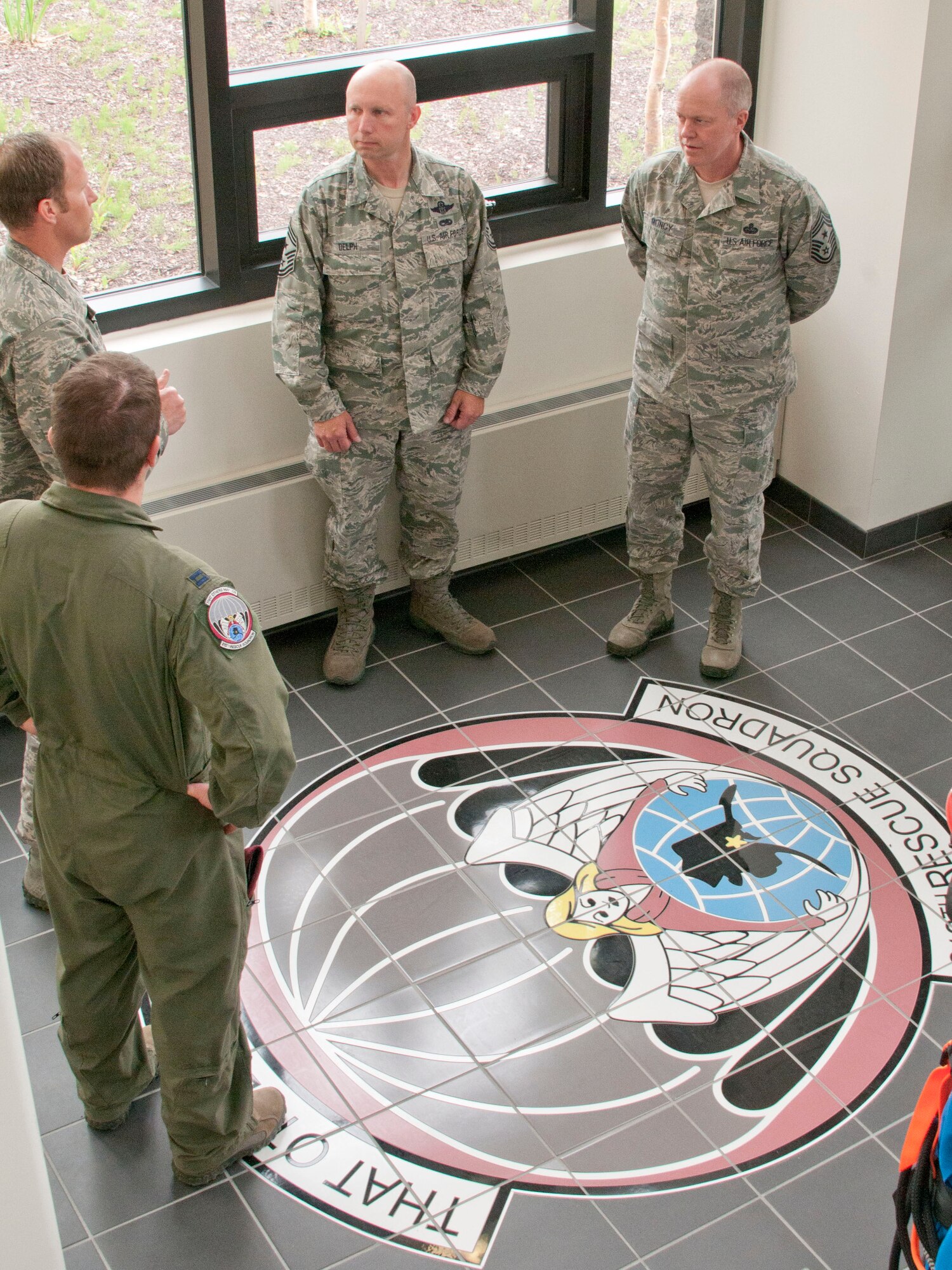 JOINT BASE ELMENDORF-RICHARDSON -- Chief Master Sgt. Chris Muncy, the command chief of the Air National Guard, toured the 212 Rescue Squadron here June 10. Muncy visited the 176 Wing guardsmen during his routine travels to Air Guard bases across the nation. National Guard photo by Staff Sgt N. Alicia Goldberger