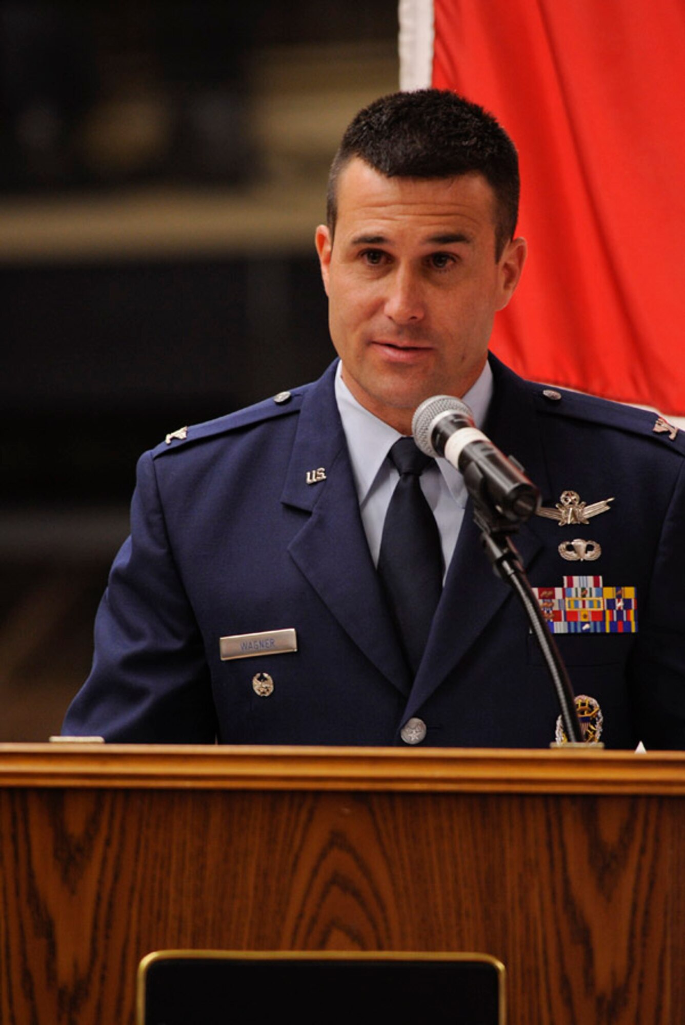 Col. John Wagner speaks with the audience after receiving command of the 614th Air and Space Operations Center following a change-of-command ceremony at Vandenberg Air Force Base, Calif., June 4, 2012. Lt. Gen. Susan Helms, commander of U.S. Strategic Command's Joint Functional Component Command for Space and 14th Air Force (Air Forces Strategic) presided over the ceremony. Wagner's previous assignment was in Washington, D.C., where he served on the Pentagon's Joint Staff as a lead planner and deputy division chief in the Strategic Plans and Policy Directorate, focused on U.S. operations in the Middle East. (U.S. Air Force photo/Staff Sgt Levi Riendeau)