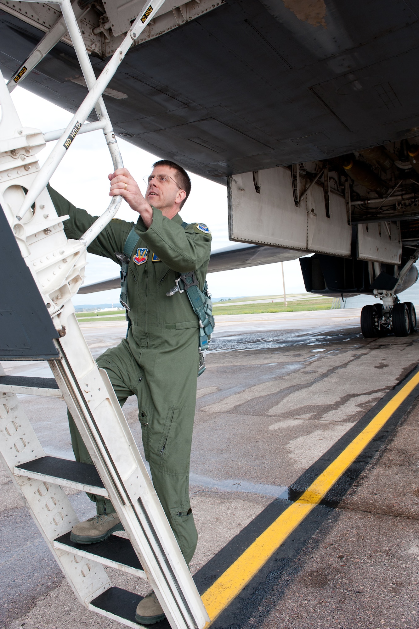 Col. Steven Hiss, 28th Bomb Wing vice commander, climbs into a B-1 to begin his final flight at Ellsworth Air Force Base S.D., June 7, 2012. In his next assignment, Hiss will serve as Professor of aerospace Science at Detachment 890 at the AF Reserve Officer Training Corps at the University of Virginia in Charlottesville, Virginia. (U.S. Air Force photo by Airman 1st Class Kate Thornton/Released)
