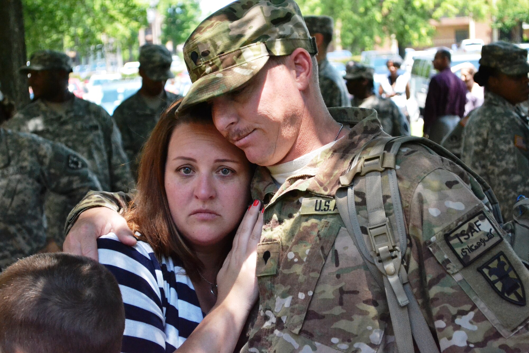U.S. Army Spc. William Hellard, assigned to the 358th Automated Cargo Documentation Detachment, 10th Transportation Battalion, 7th Sustainment Brigade hugs his family one more time after the “Scan Devils” deployment ceremony at the McClellan Fitness Center at Ft. Eustis, Va., June 7, 2012. Twenty-one Soldiers from the 358th ACDD deployed to the northern region of Afghanistan in support of cargo operations and the documentation of movement in and out of country.
(U.S. Army photo by Sgt. Edwin Rodriguez/Released)
