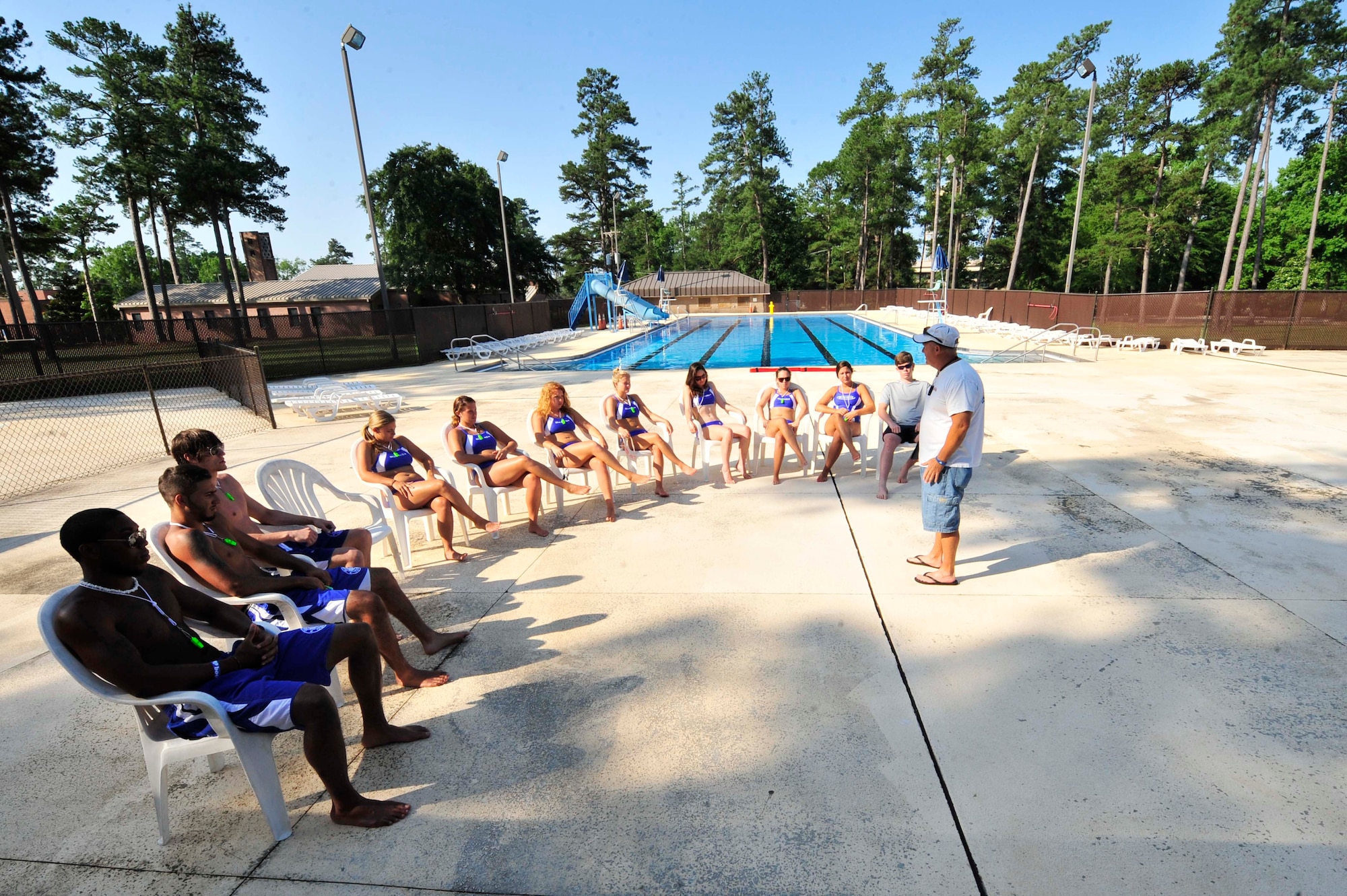 Tim Godwin, 20th Force Support Squadron director of outdoor activities, teaches a lifeguard in-service emergency training class to the Woodland Pool lifeguards at Shaw Air Force Base, S.C., May 31.2012.  On May 25, the pool opened for the swim season.(U.S. Air Force photo by Airman Nicole Sikorski/Released)