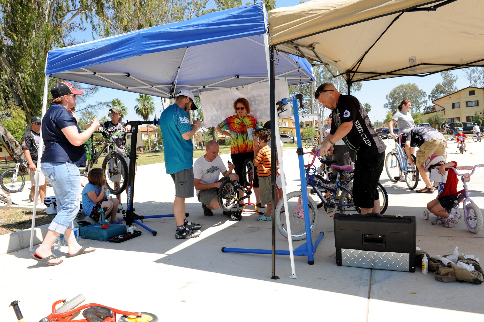 Airmen and family members gather at the Eagle Housing park for a Bicycle Safety Rodeo June 9, 2012, at Incirlik Air Base, Turkey. The annual event is designed to inform bicycle riders of all ages about proper safety techniques to use while riding a bicycle. (U.S. Air Force photo by Senior Airman Jarvie Z. Wallace/Released)