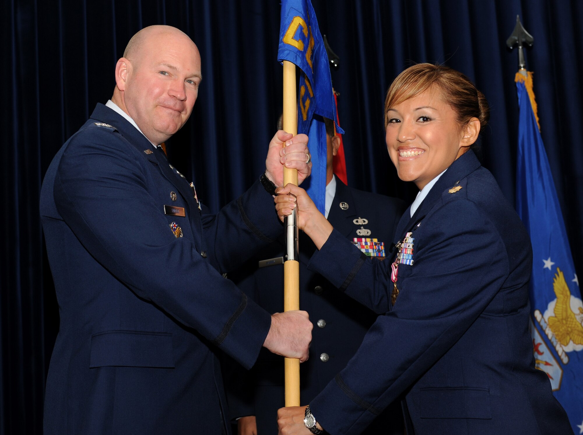 Maj. Kim Arnold, outgoing 39th Contracting Squadron commander, relinquishes command of the 39th CONS during the change-of-command ceremony June 11, 2012, at Incirlik Air Base, Turkey. Col. Scott Enold , 39th Mission Support Group commander, was the presiding officer for the ceremony. (U.S. Air Force photo by Senior Airman Jarvie Z. Wallace/Released)
