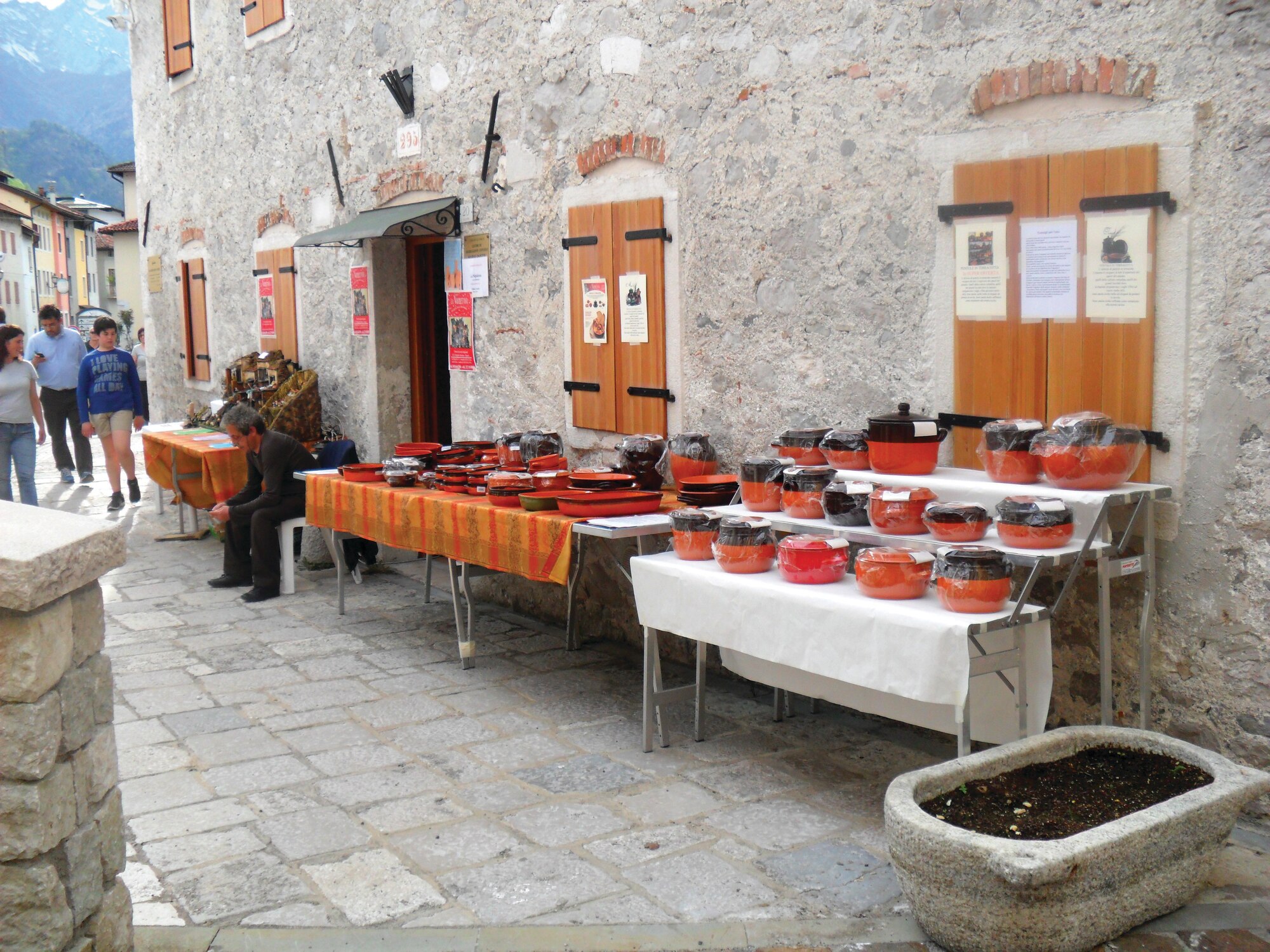 A vendor sells ceramic pots at a market in Barcis. The ceramics market recently held in Barcis is one of several markets held throughout the year.(U.S.Air Force photo/Senior Airman Katherine Windish)