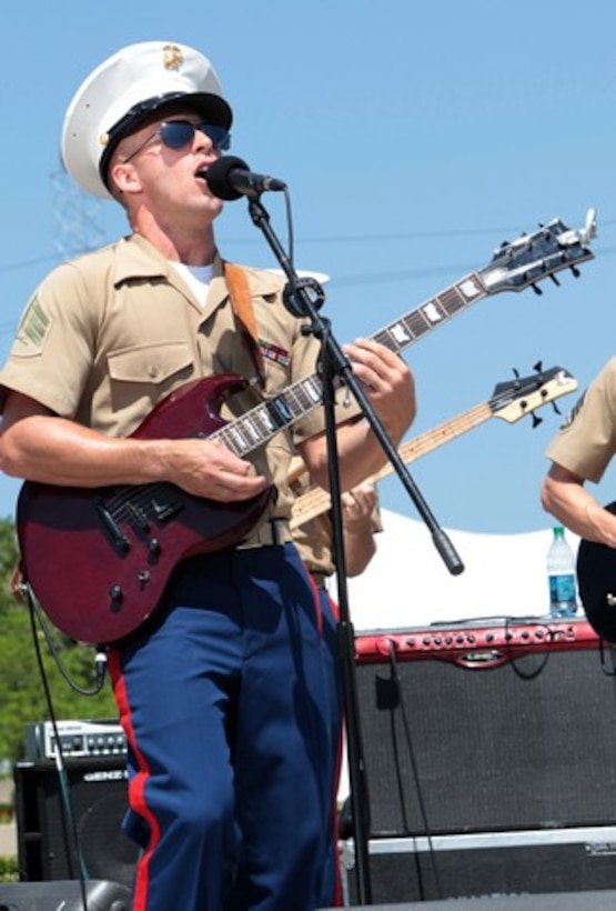 CLEVELAND â?? Sgt. Zachary Wendt, a musician with the Marine Corps Base Quantico Band and a Pulaski, Wis., native, sings Seven Nation Army by The White Stripes during a rock â??nâ?? roll performance at the Rock and Roll Hall of Fame and Museum in Cleveland June 11, 2012. The Virginia-based band will showcase its skills around Cleveland to include Public Square and the Indiansâ?? baseball game Friday during Marine Week Cleveland, which ends June 17. More than 750 Marines will be in Cleveland all week displaying Marine aircraft, vehicles and equipment, as well as interacting with and educating the public on the values and character of the Marine Corps. One of the culminating events will be a Marine Air Ground Task Force demonstration, which showcases Marines' ability to assault from ship-to-shore via ground and air, June 16-17 at Burke Lakefront Airport.