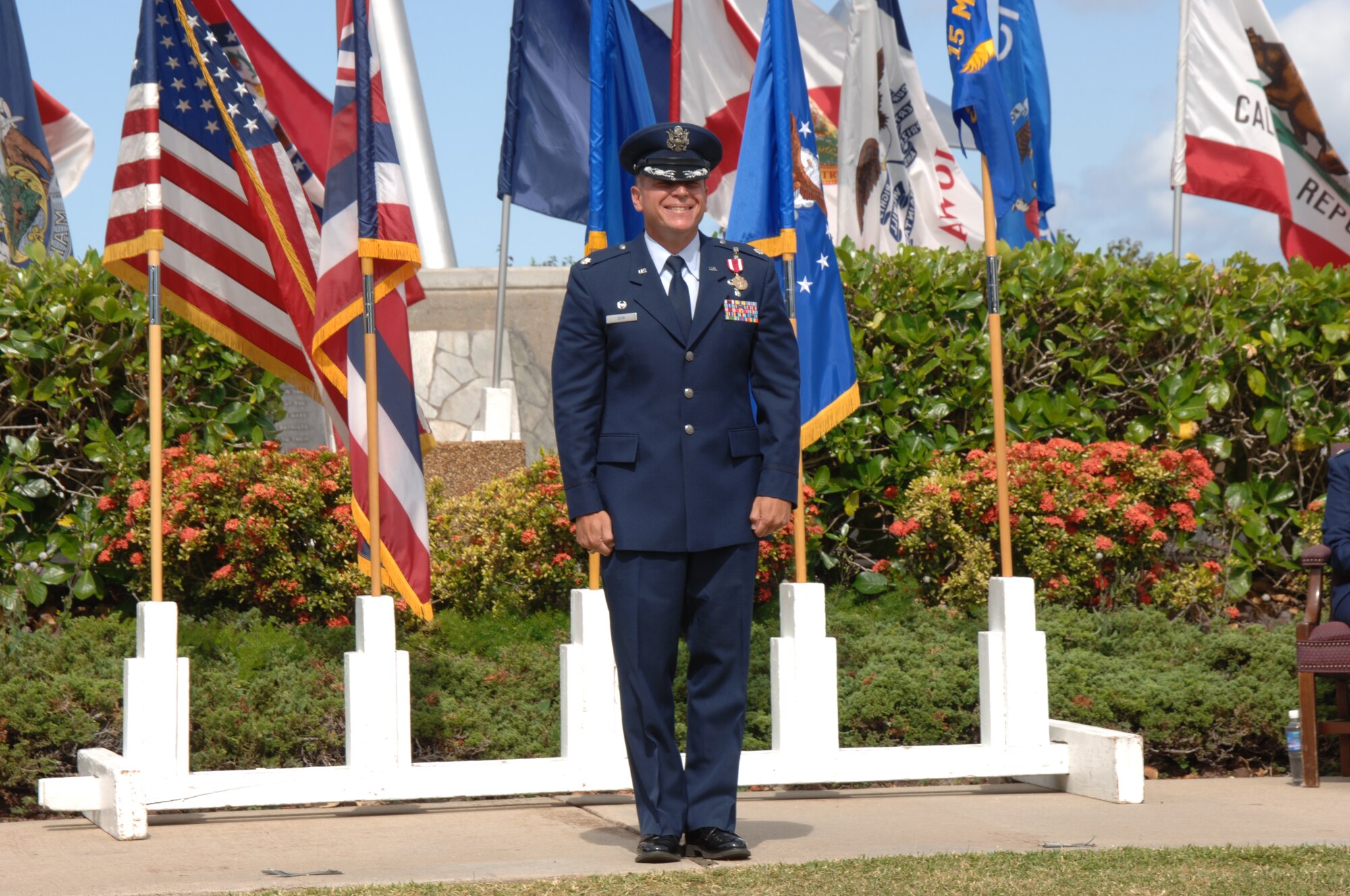 Lt. Col. Christopher Dun, outgoing 15th Medical Support Squadron commander, stands at attention during the 15th MDSS Change of Command ceremony June 12 at Joint Base Pearl Harbor-Hickam, Hawaii. The 15th MDSS was constituted on August 25, 1994 and activated on September 15, 1994. (U.S. Air Force photo by Ed Foster)