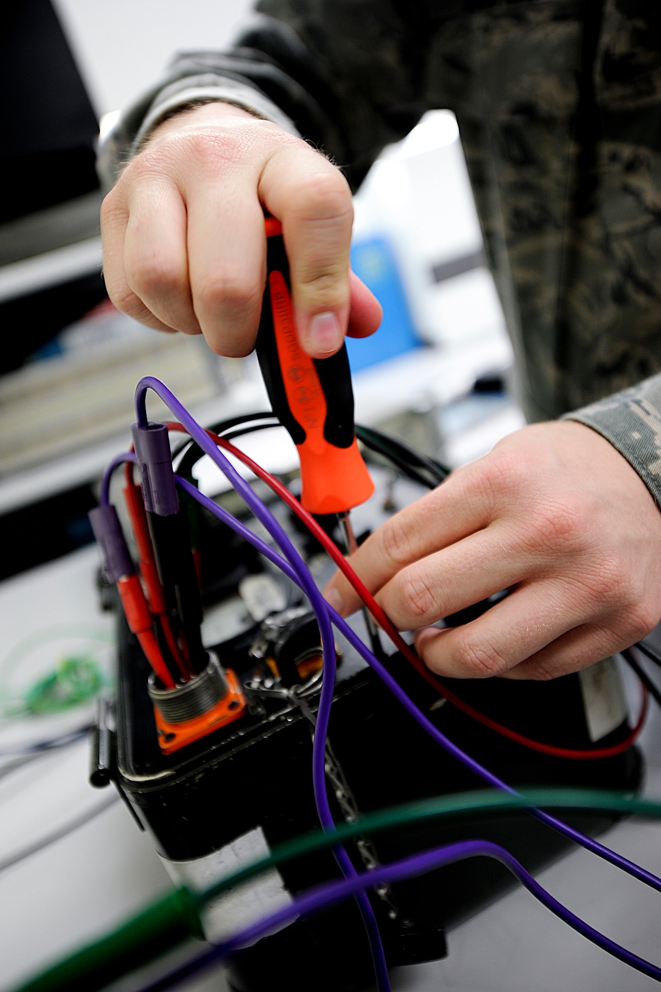 U.S. Air Force Senior Airman Elijah Bacchus, 18th Component Maintenance Squadron technician, performs a scheduled calibration at the Precision Measurement Equipment Laboratory on Kadena Air Base, Japan, June 12, 2012. PMEL is responsible for calibrating systems from more than 200 work centers throughout the Pacific Air Forces.  (U.S. Air Force photo/ Airman 1st Class Brooke P. Beers)