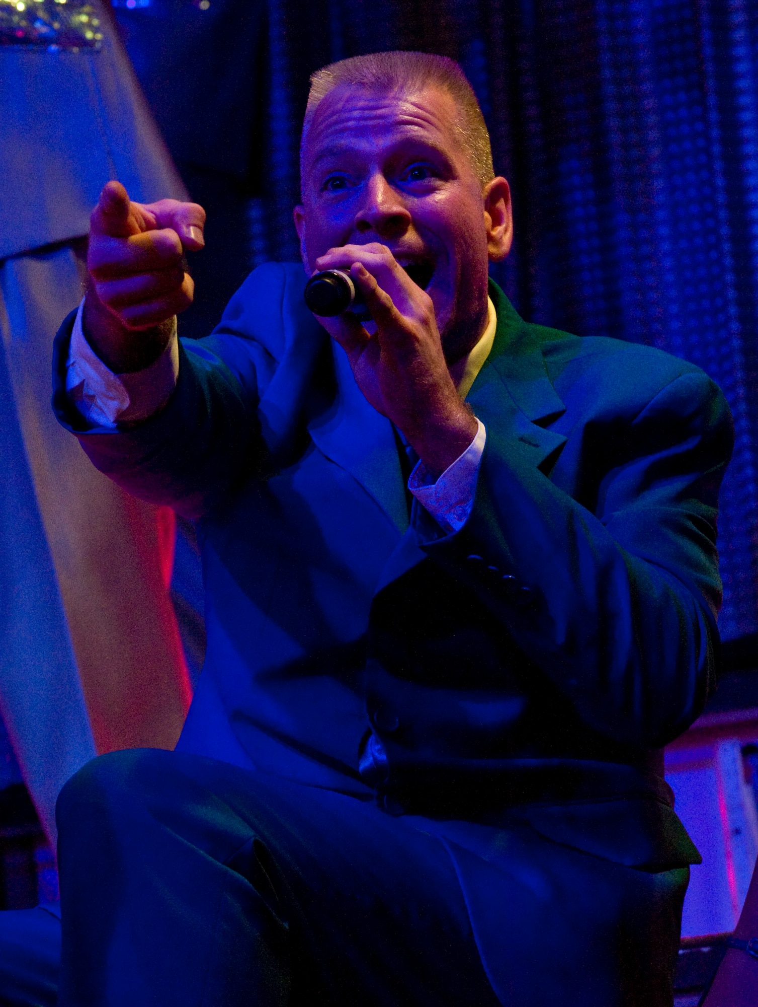 U.S. Air Force Master Sgt. Matt Lemieux, Headquarters, U.S. Air Forces in Europe airborne missions specialist and Tops in Blue vocalist, performs at Las Vegas' Fremont Street Experience June 8, 2012, Las Vegas. Tops in Blue has been entertaining audiences worldwide for more than 60 years. (U.S. Air Force photo by Master Sgt. Jason W. Edwards)