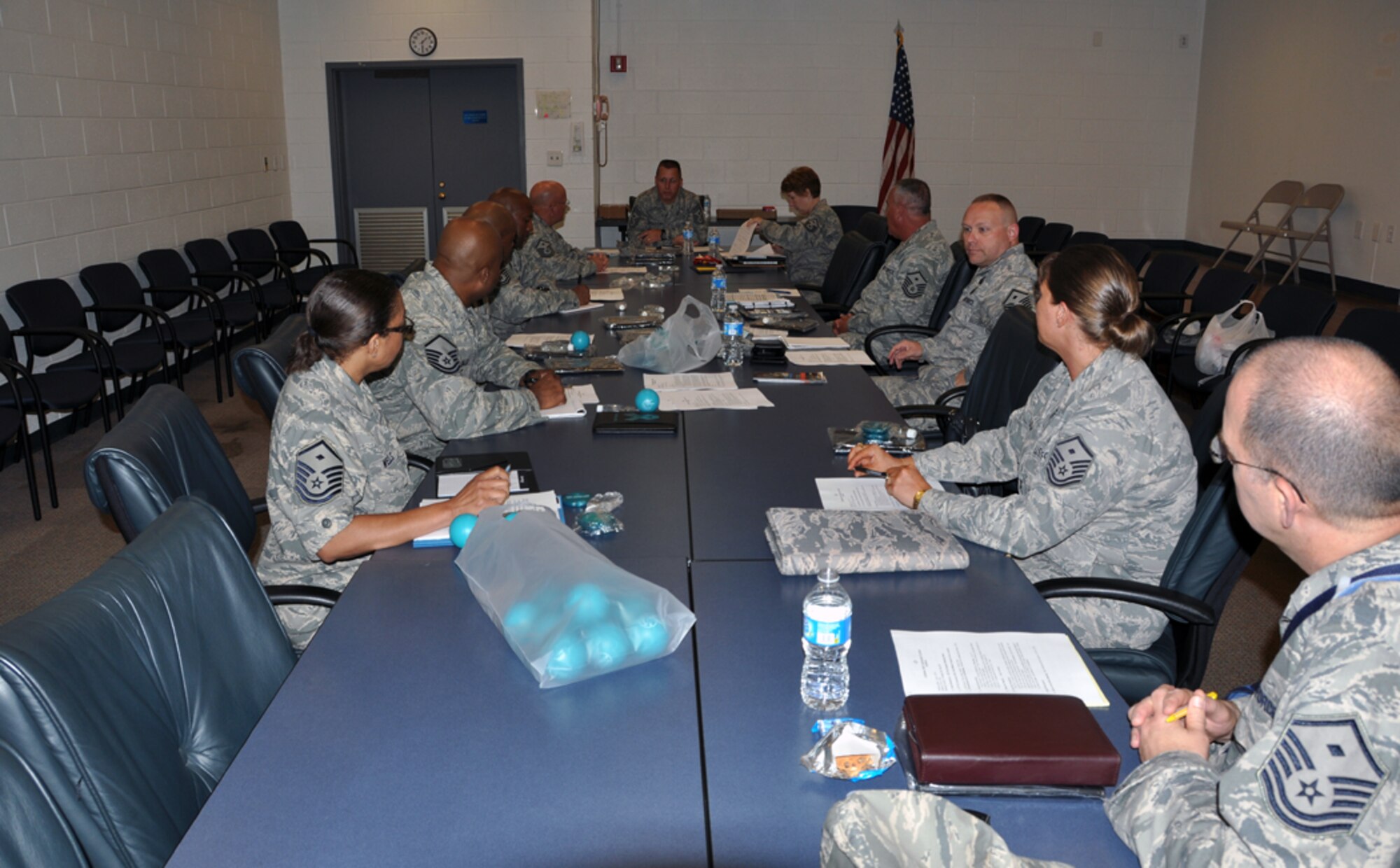 The 94th Airlift Wing first sergeants listen to Chief Master Sgt. Steven M. Larwood, 22nd Air Force command chief, as he speaks on upcoming changes to the first sergeant corps on June 1. Expected changes include a drastic rewrite of the Air Force Instruction concerning the first sergeant’s position and the first sergeants’ role in helping their Airmen deal with coming changes within the Air Force. (U.S. Air Force photo/Senior Airman Elizabeth Gaston)