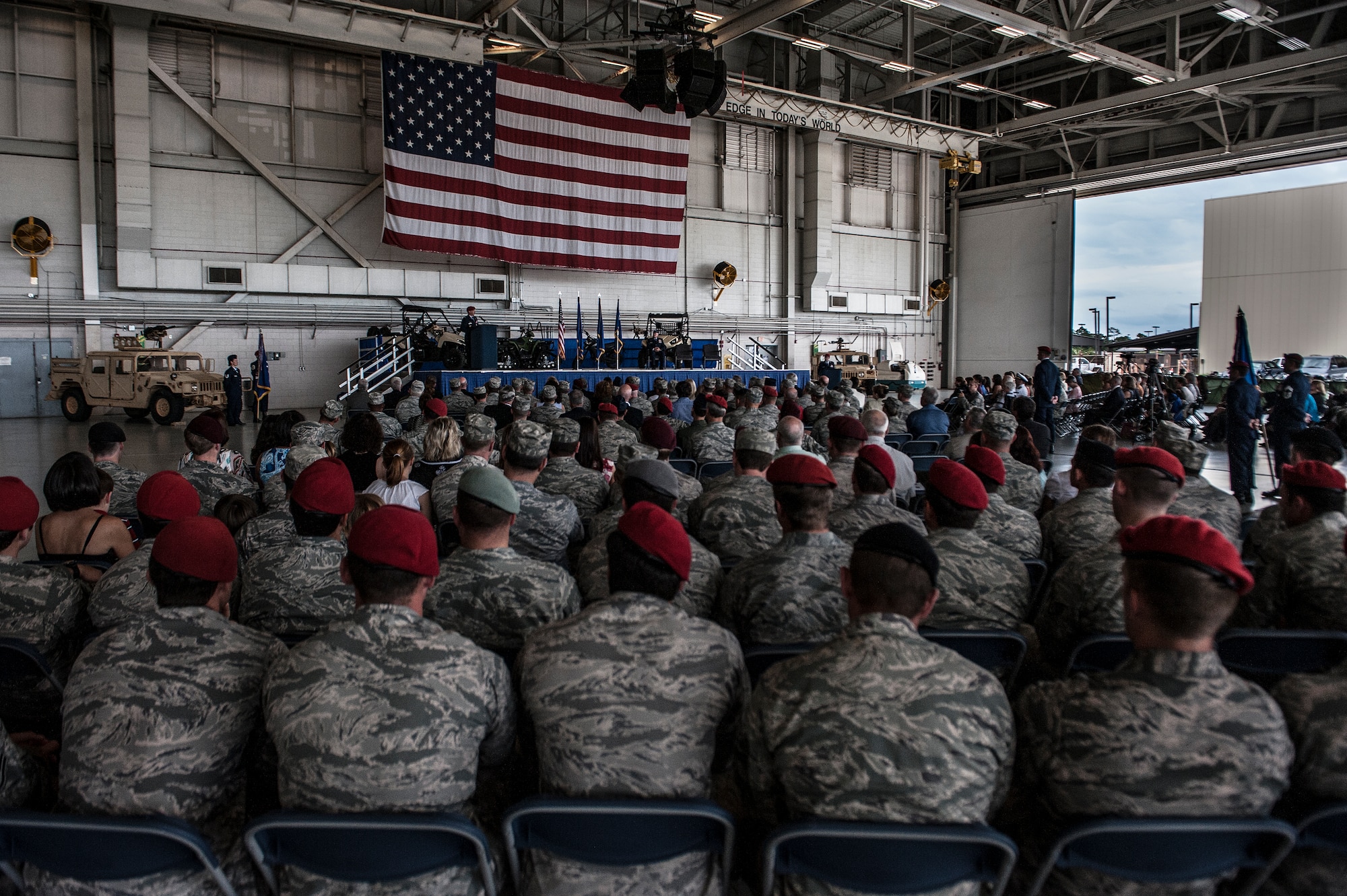 U.S. Air Force members gathered at Freedom Hangar for the 720th Special Tactics Group change of command and the activation of the 24th Special Operations Wing on Hurlburt Field, Fla., June 12, 2012. Col. Robert Armfield relinquished command of the 720th STG to Col. Kurt Buller then assumed command of the 24th SOW. (U.S. Air Force photo/Airman 1st Class Christopher Williams