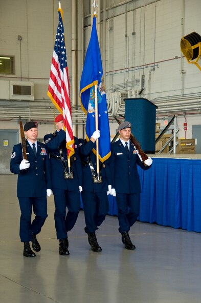 Special tactics service members present the colors during the 720th Special Tactics Group change of command and the 24th Special Operations Wing?s activation at Freedom Hangar on Hurlburt Field, Fla., June 12, 2012. Col. Robert Armfield assumed command of the newly created 24th SOW and passed command of the 720th STG to Col. Kurt Buller. (U.S. Air Force photo/Airman 1st Class Michelle Vickers)
