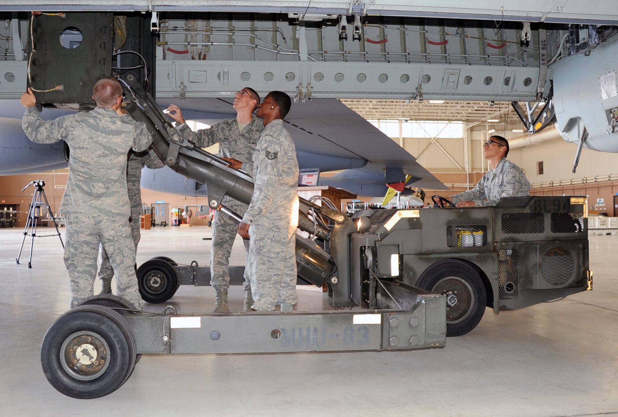 Airmen from the 363rd TRS train on loading munitions on a B-52.  The B-52 Armament Systems Apprentice course teaches airmen the fundamentals of B-52 armament systems.  (US Air Force Photo/Josh Wilson)