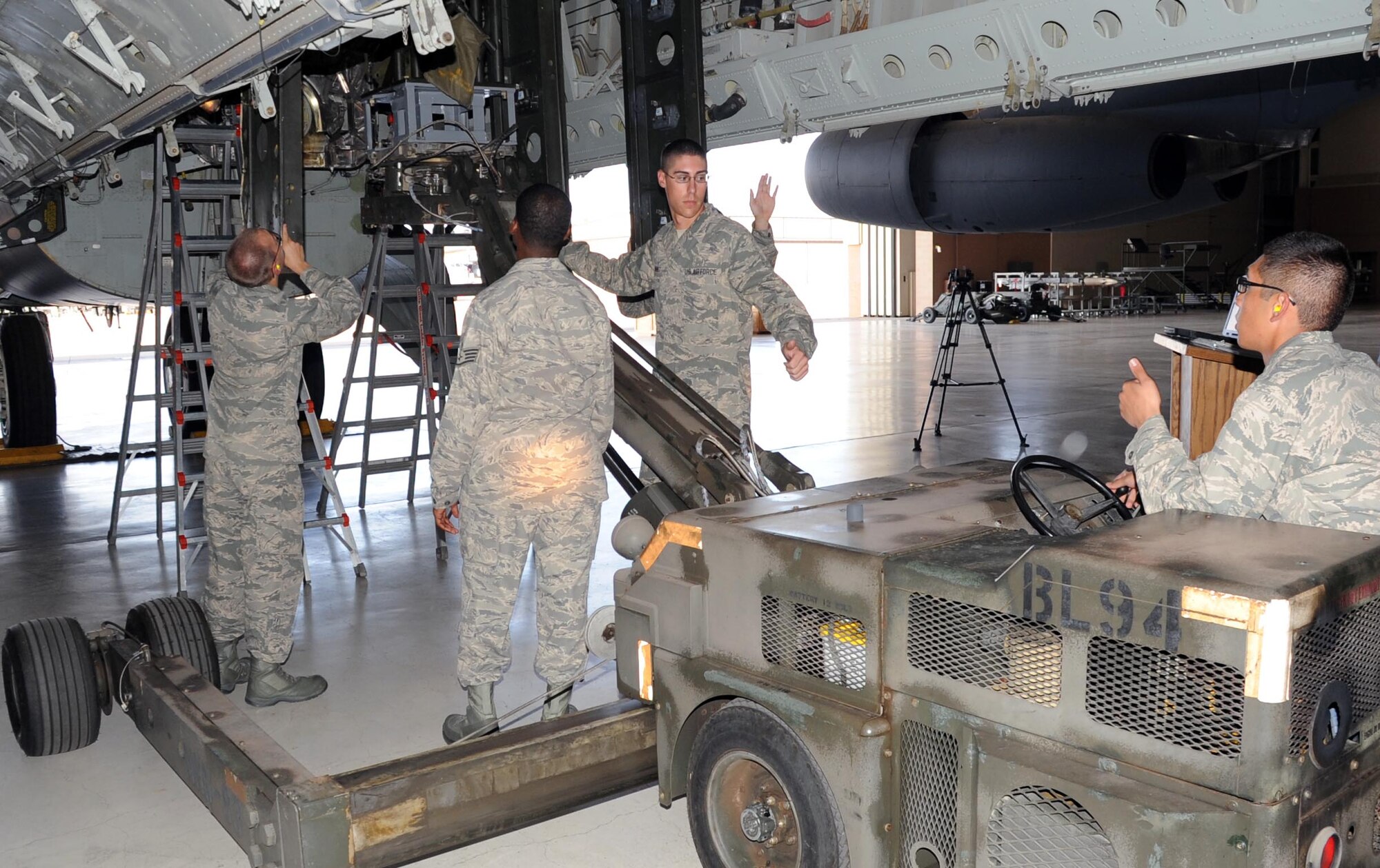 Airmen from the 363rd TRS train on loading munitions on a B-52.  The B-52 Armament Systems Apprentice course teaches airmen the fundamentals of B-52 armament systems.  (US Air Force Photo/Josh Wilson)