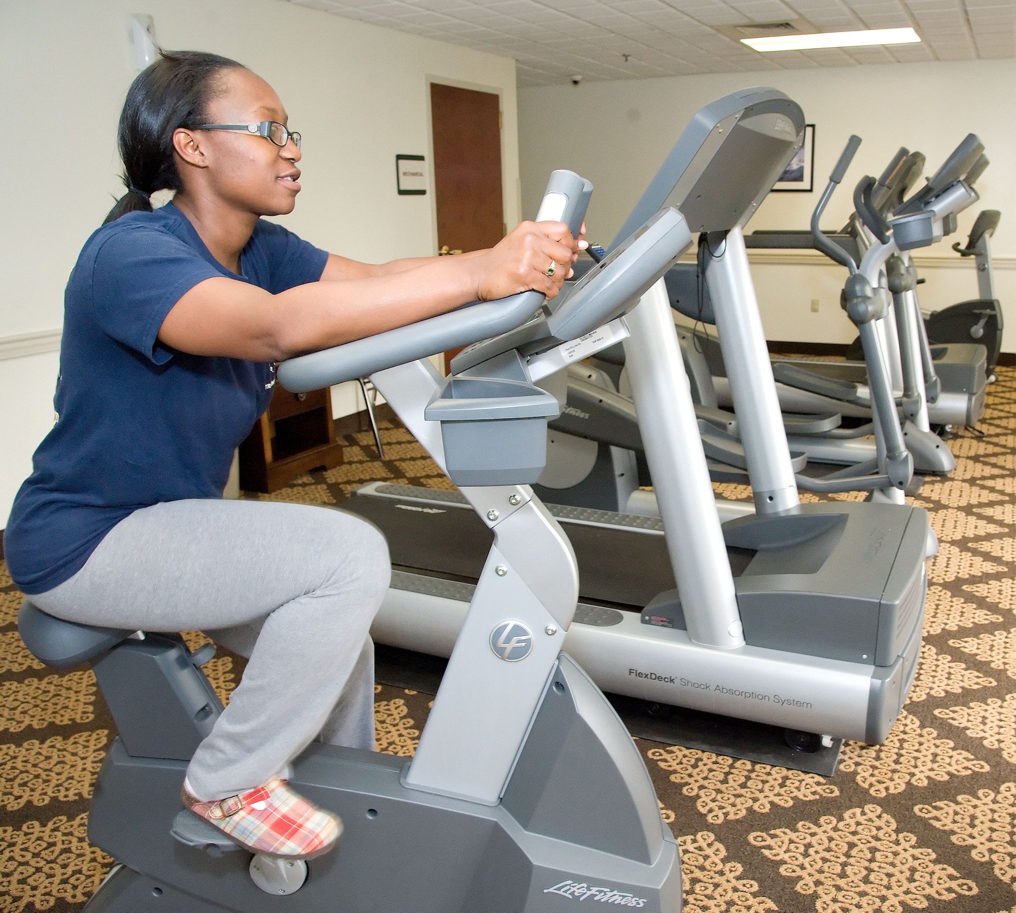 Monique Eley works out in the gym at the Eagles’ Rest Inn June 4, 2012, at Dover Air Force Base, Del. The Eagles’ Rest Inn offers a variety of guest services. (U.S. Air Force photo by Adrian R. Rowan)