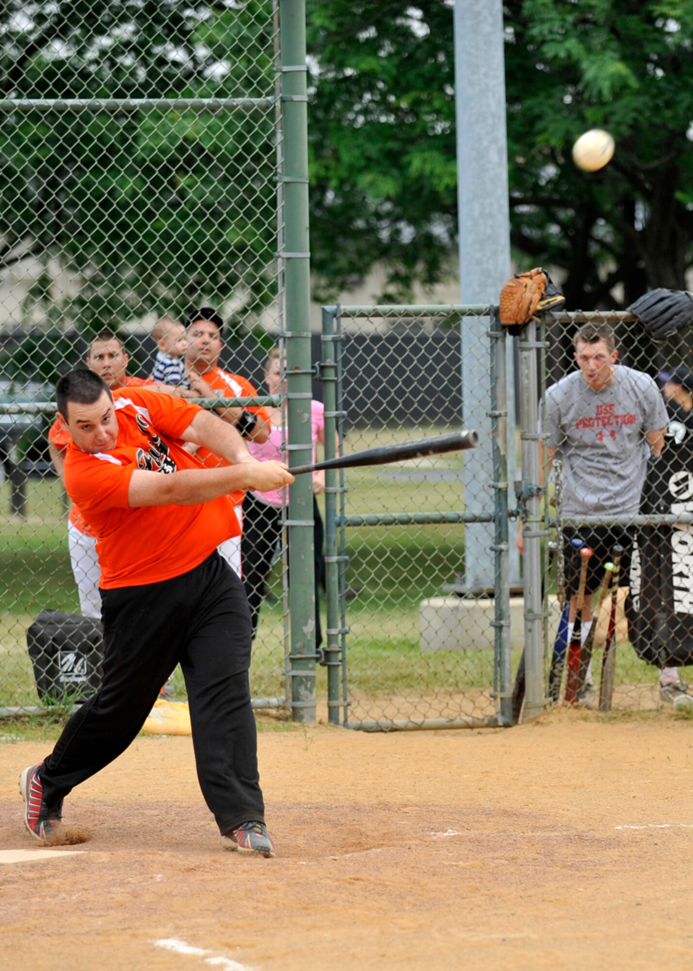 Brandon Shelton, 436th Security Forces A team third baseman, blasts a two-run double during an American League intramural softball game June 11, 2012, at Dover Air Force Base, Del. The 436th SFS A team defeated the 436th Maintenance Squadron B team 14-13. (U.S. Air Force photo by Tech. Sgt. Chuck Walker)