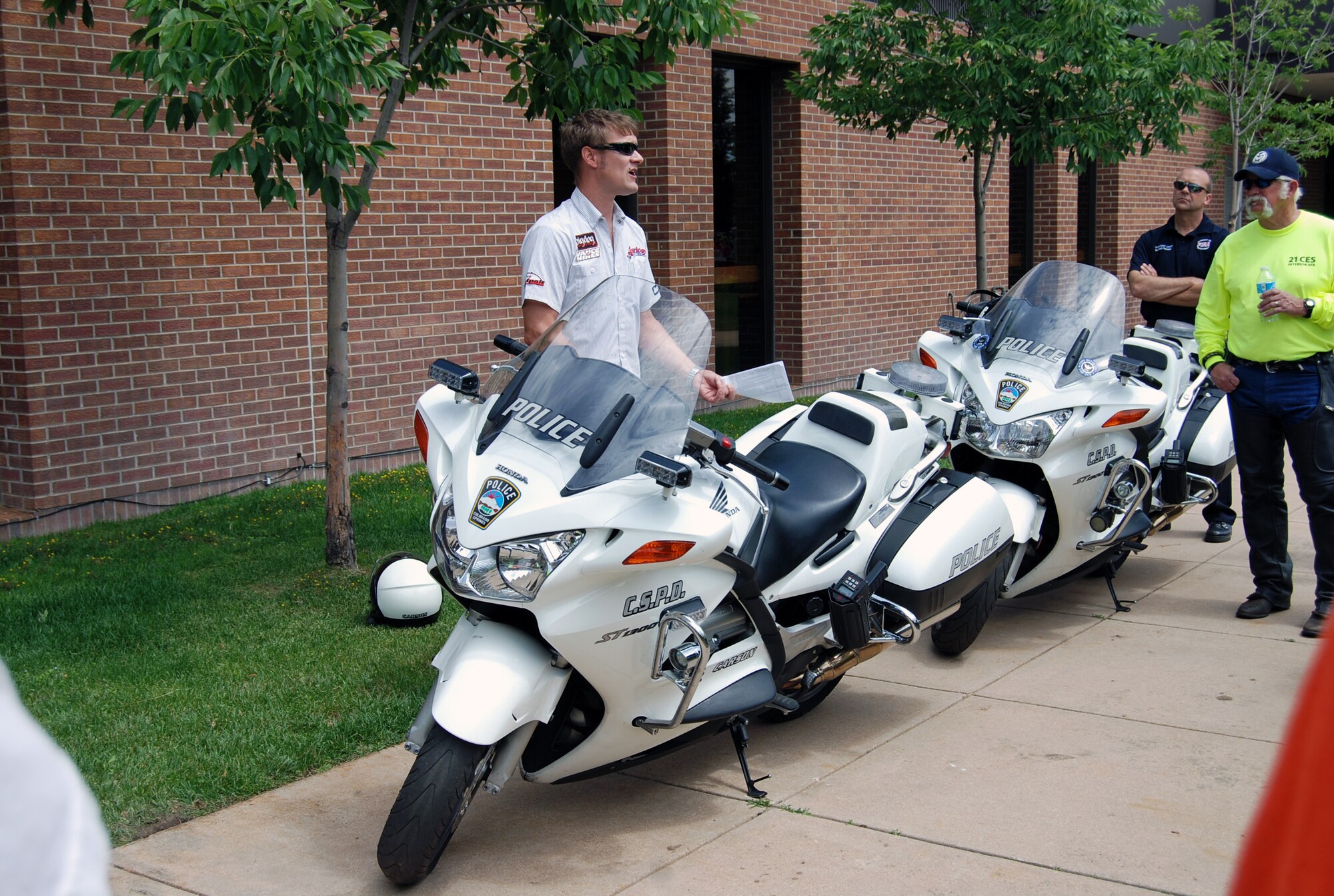PETERSON AIR FORCE BASE, Colo. - Eric Reed, American Motorcycles’ owner, gives a motorcycle safety briefing during Motorcycle Safety Day June 5, 2012. Motorcycle Safety Day was part of the Critical Days of Summer campaign. Accidents involving motorcyclists made up 39 percent of fatalities during the summer of 2011. Following the safety briefing, the Peterson Air Force Base Diamond Council sponsored a poker run. (U.S. Air Force photo/Lea Johnson)