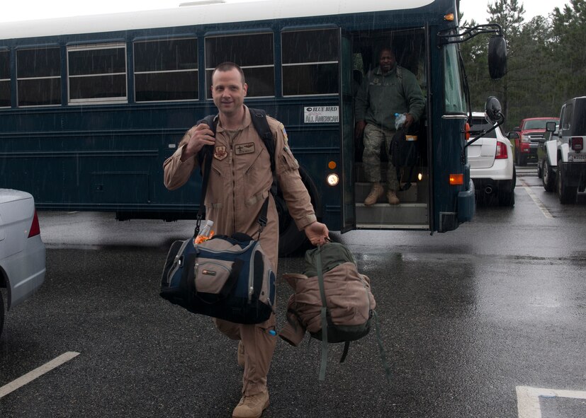 U.S. Air Force Maj. Sean Hosey, 71st Rescue Squadron, and Senior Master Sgt. Keith Terry, 723d Aircraft Maintenance Squadron, return home from a four-month deployment to Afghanistan June 9, 2012, at Moody Air Force Base, Ga. More than 20 Airmen from the 71st RQS and 40 Airmen from the 723d AMXS returned from Camp Bastion where they supported Operation Enduring Freedom. (U.S. Air Force photo by Senior Airman Eileen Meier/Released) 