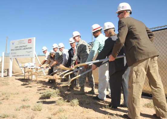 KIRTLAND AFB, N.M. – Groundbreaking on the Air Force Research Laboratory, Space Vehicle Directorate's, Space Sensors Laboratory occurred June 7.  The new 6,000 square foot facility will contain office space for 15 personnel and two new labs.  Pictured left to right are Mike Granjean, vice president, GranCor Enterprises, Inc.; Maria Cornay, president, GranCor Enterprises, Inc.; Col. Bill Cooley, materiel wing director, Space Vehicles Directorate; Dr. Mayer Landau, scientist, Space Vehicles Directorate; Michael Gallegos, chief, Infrastructure Management Branch, Space Vehicles Directorate; Col. Edward Masterson, division chief, Spacecraft Technology Division, Space Vehicles Directorate; Filemon Gallegos, project manager, U.S. Army Corps of Engineers, Albuquerque District; Sue Atwood, deputy director, Space Vehicles Directorate; and Dr. Christian Morath, scientist, Space Vehicles Directorate. (Photo by Todd Berenger)