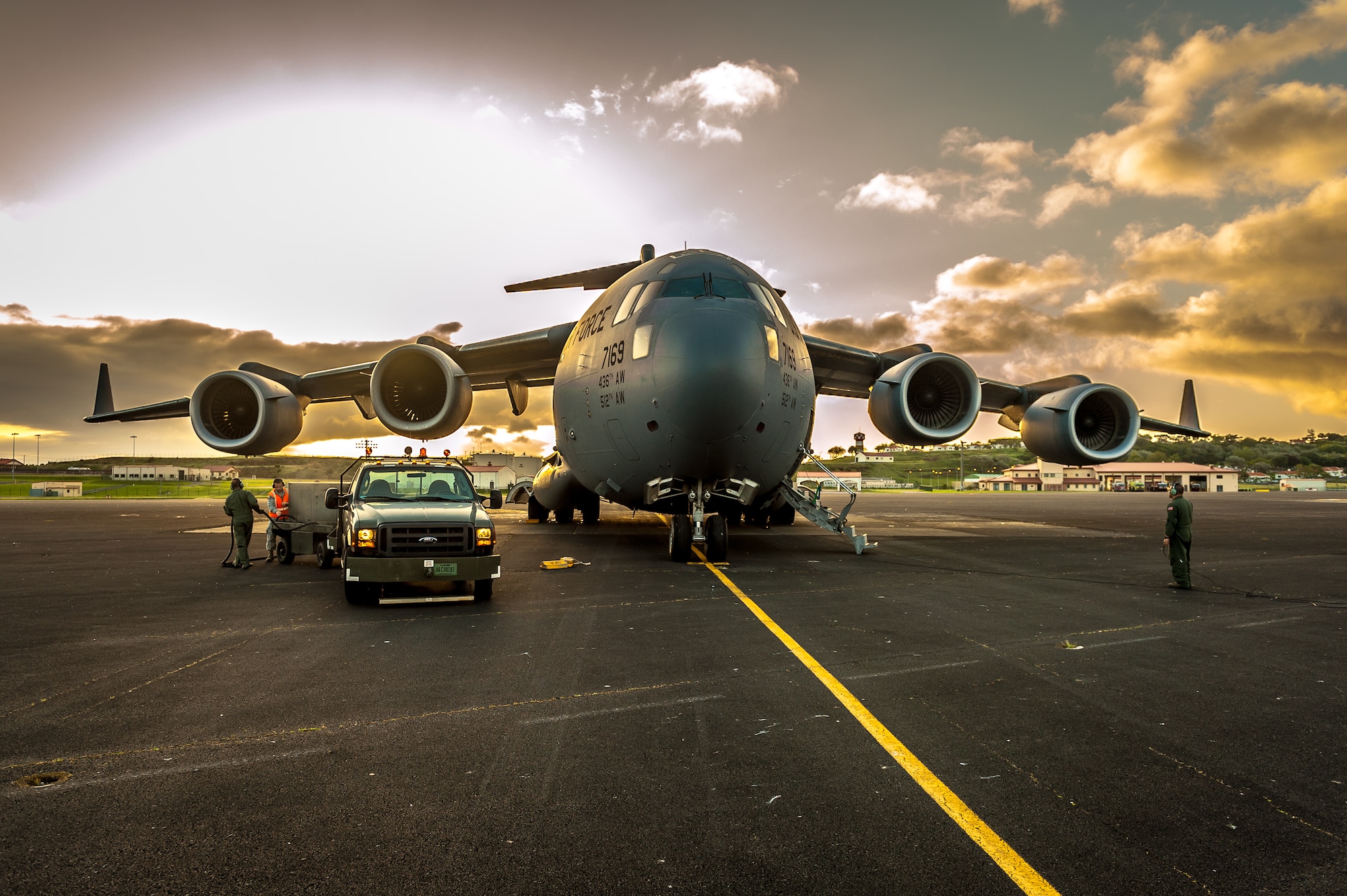 A C-17 Globemaster carrying reservists from the 419th Logistics Readiness Squadron from Hill Air Force Base, Utah, sits on the Lajes Field flight line on June 8, 2012. Members of the 419th LRS will join with the 65th LRS to complete an annual training and to exercise the 65th Air Base Wing's force reception abilities. (U.S. Air Force photo by Lucas Silva)