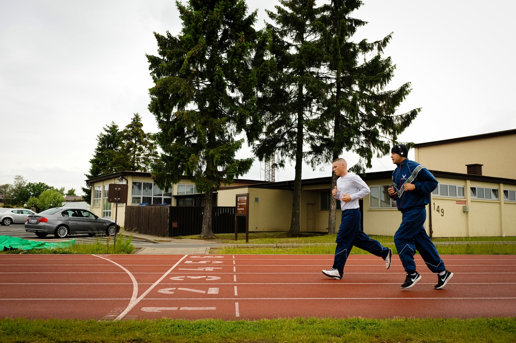 SPANGDAHLEM AIR BASE, Germany – Participants jog around the base track during a Wounded Warrior walk-a-thon here June 7. More than 230 people participated in the event, which raised funds for wounded warrior programs at Landstuhl Regional Medical Center. (U.S. Air Force photo by Staff Sgt. Nathanael Callon/Released)