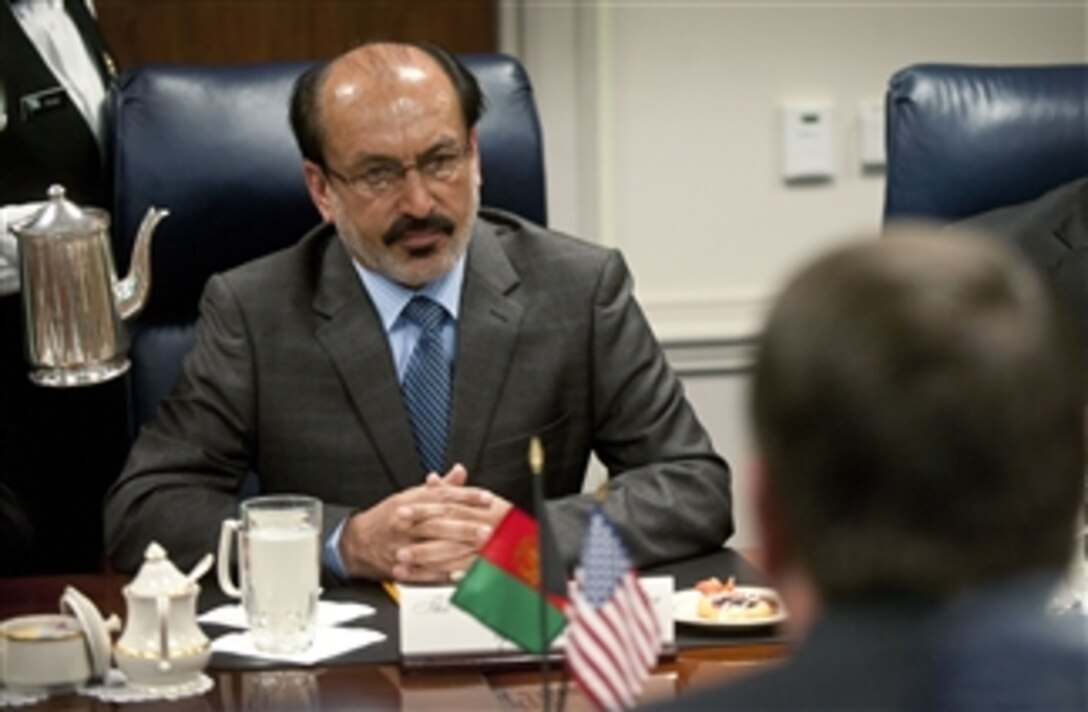 First Deputy Minister of Defense for Afghanistan Enayatullah Nazari listens to the opening remarks by Deputy Secretary of Defense Ashton B. Carter as they meet in the Pentagon on June 8, 2012.  