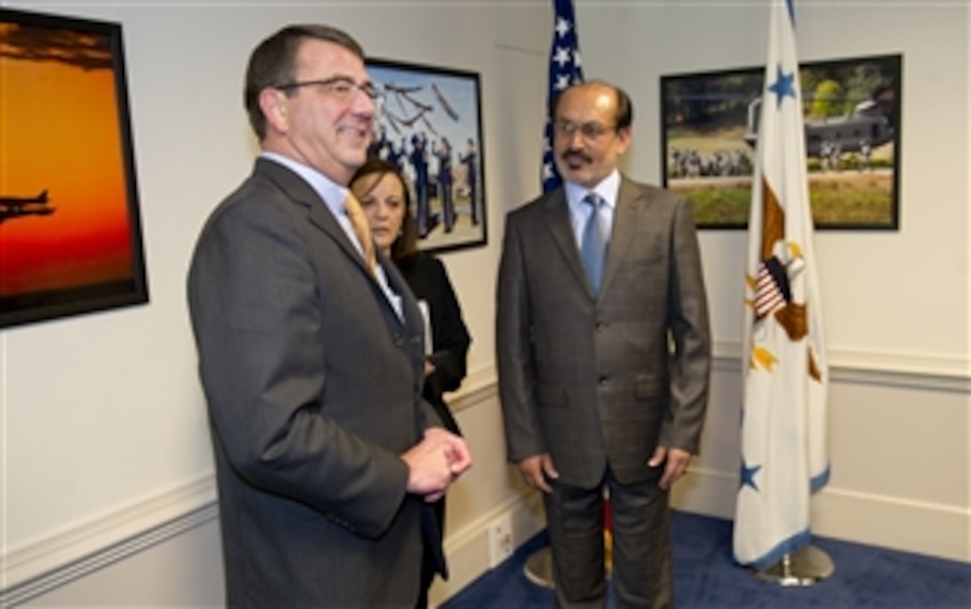 Deputy Secretary of Defense Ashton B. Carter (left) introduces members of his staff before they meet with First Deputy Minister of Defense for Afghanistan Enayatullah Nazari in the Pentagon on June 8, 2012.  