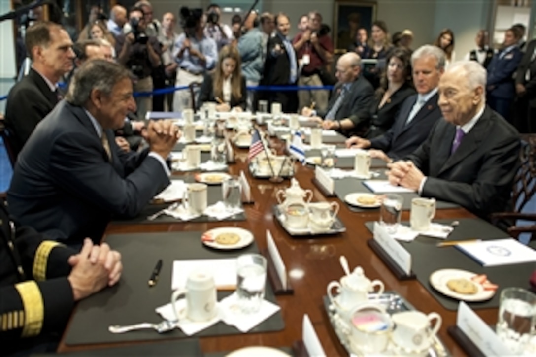 Secretary of Defense Leon E. Panetta delivers his welcoming remarks to Israel's President Shimon Peres as they begin their meeting in the Pentagon on June 11, 2012. Panetta, Peres, and their senior advisors are meeting to discuss security issues and the strong relationship between the United States and Israel.  