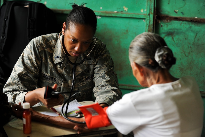 Air Force 1st Lt. Jackie Brooks, Medical Element nurse, checks a patient’s blood pressure during a two-day joint Medical Readiness Training Exercise in partner with El Salvador’s Ministry of Health and military. The team provided medical care to 776 patients in the municipalities of El Castano and Rancho San Marcos, El Salvador. (U.S. Air Force photo/1st Lt. Christopher Diaz)