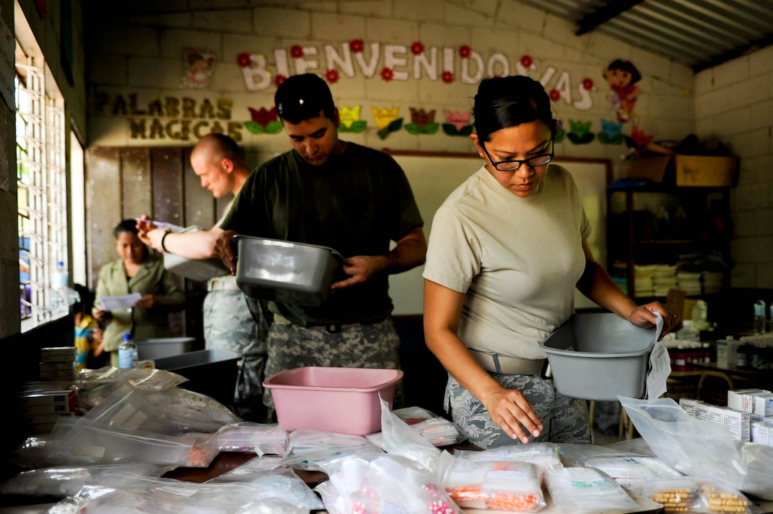 120613-F-VM296-003
Airman First Class Francine Pascual, Medical Element health systems management technician, retrieves medicine that will be given to a patient. JTF-Bravo recently provided care to 776 local patients in the municipalities of El Castano and Rancho San Marcos, El Salvador, during a two-day joint Medical Readiness Training Exercise in partner with the country’s Ministry of Health and military. (U.S. Air Force photo/1st Lt. Christopher Diaz)
