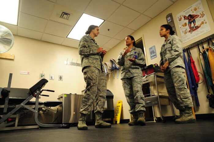 Major Lee Warlick, a physical therapist with the 628th Medical Group, shows Cadet 2nd Class Raika Dacquel and Samantha Laughlin students with the Air Force Academy, the Physical Therapy center at Joint Base Charleston, S.C. June 8, 2012. Cadets visited JB Charleston to get a first-hand look at various career opportunities. (U.S. Air Force photo/Staff Sgt. Katie Gieratz)