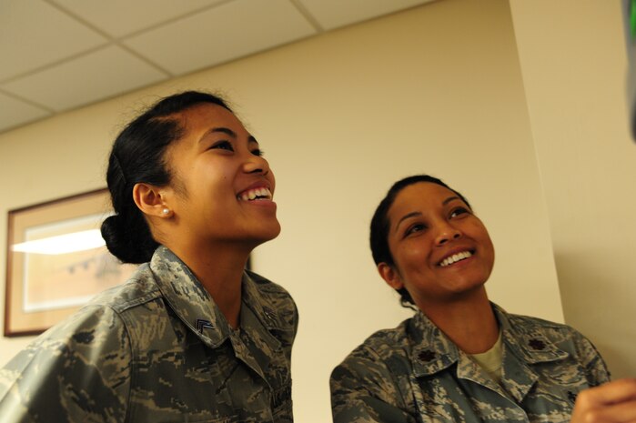 Major Lee Warlick, a physical therapist with the 628th Medical Group, shows Cadet 2nd Class Raika Dacquel, a student with the Air Force Academy, the Biodex Balance Trainer which is used to improve balance and sense of ones lower extremities at the Physical Therapy center on Joint Base Charleston, S.C. June 8, 2012. Cadets visited JB Charleston to get a first-hand look at various career opportunities. (U.S. Air Force photo/Staff Sgt. Katie Gieratz)