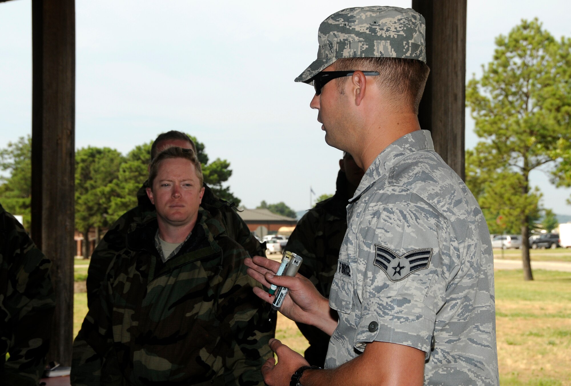 Senior Airman James McFerron with the 188th Emergency Management Flight teaches Airmen with the 188th Fighter Wing the process to administer nerve agent antidote during a Chemical, Biological, Radiological, Nuclear and High Yield Explosives (CBRNE) class at the 188th June 7, 2012. The 188th Airmen are gearing up for an Air Expeditionary Forces deployment to Afghanistan later this summer. (National Guard photo by Airman 1st Class Hannah Landeros/188th Fighter Wing Public Affairs) 
