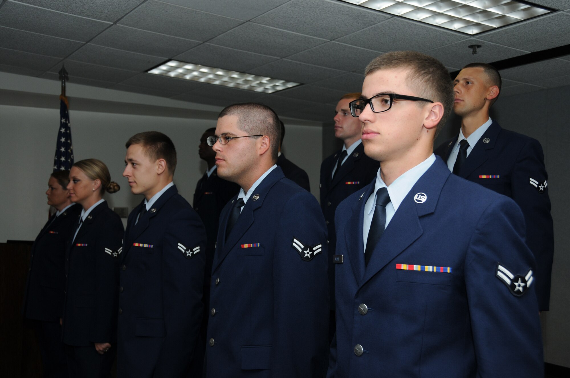 Airman 1st Class John Moore graduated with a perfect score from financial management and comptroller course in the 335th Training Squadron June 5, 2012, at Wolfe Hall, Keesler Air Force Base, Miss. Moore, a native of Columbia, Tenn., is now assigned to the 17th Comptroller Squadron, Goodfellow Air Force Base, Texas.  (U.S. Air Force photo by Kemberly Groue)
