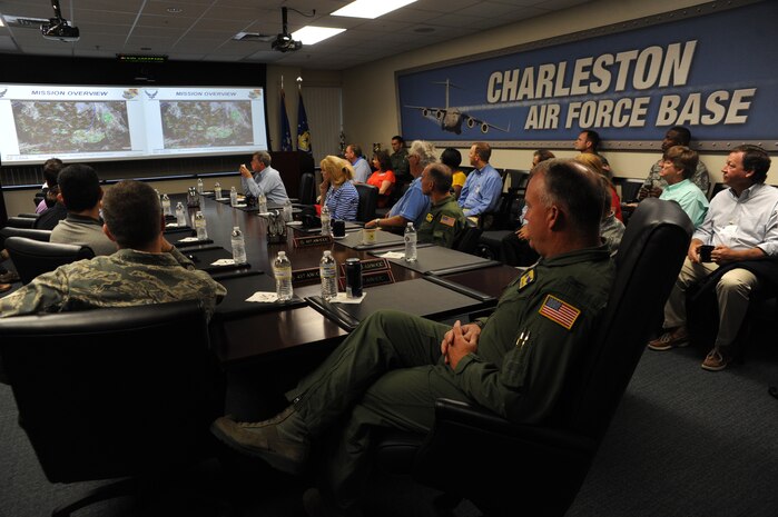 Team Charleston Honorary commanders and Team Charleston leadership attend a pre-flight briefing before an orientation flight, out of Joint Base Charleston. S.C.  June 12, 2012. The honorary commanders program is used as a tool to educate local community leaders about the various missions at JB Charleston. The tours will take place on a quarterly basis, and as part of that education process, the 437th AW set aside a full day to give the civics an in-depth look at the wing's flying mission. It afforded them the opportunity to meet the Airmen, both maintainers and operators, who support the mission. (U.S. Air Force photo/Airman 1st Class Ashlee Galloway)

