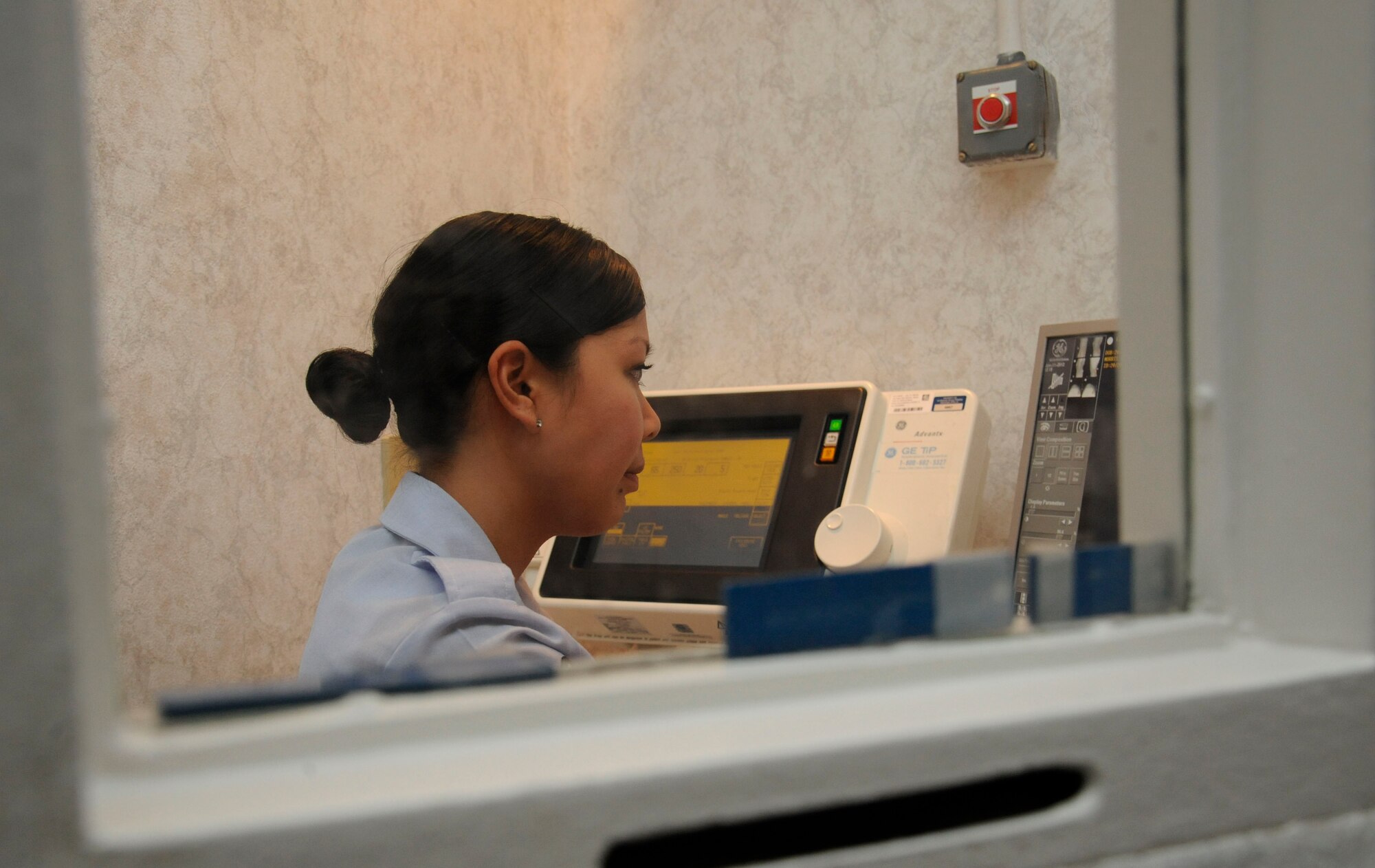 Airman 1st Class Christina Blanco, 2nd Medical Support Squadron radiology technician, reviews a patient's X-ray information on Barksdale Air Force Base, La., June 11. After taking an X-ray, Blanco sends it to the radiologist who reviews the image, then refers it to the patients Primary Care Manager. (U.S. Air Force photo/Airman 1st Class Andrew Moua)(RELEASED)