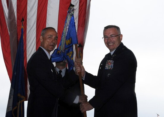 ALTUS AIR FORCE BASE, Okla. – Brig. Gen. Udo K. “Karl” McGregor, commander of the 452nd Air Mobility Wing, March Air Reserve Base, Calif., passes the 730th Air Mobility Training Squadron guidon to Lt. Col.  Jonathan M. Philebaum, 730th AMTS commander, Altus AFB, during the squadron reactivation and assumption of command at hangar 517 June 13, 2012. The 730th AMTS falls under the 452nd Air Mobility Wing at March ARB and is part of the Air Force Reserve Command. (U.S. Air Force photo by Airman 1st Class Franklin R. Ramos / 97th Air Mobility Wing / Released)